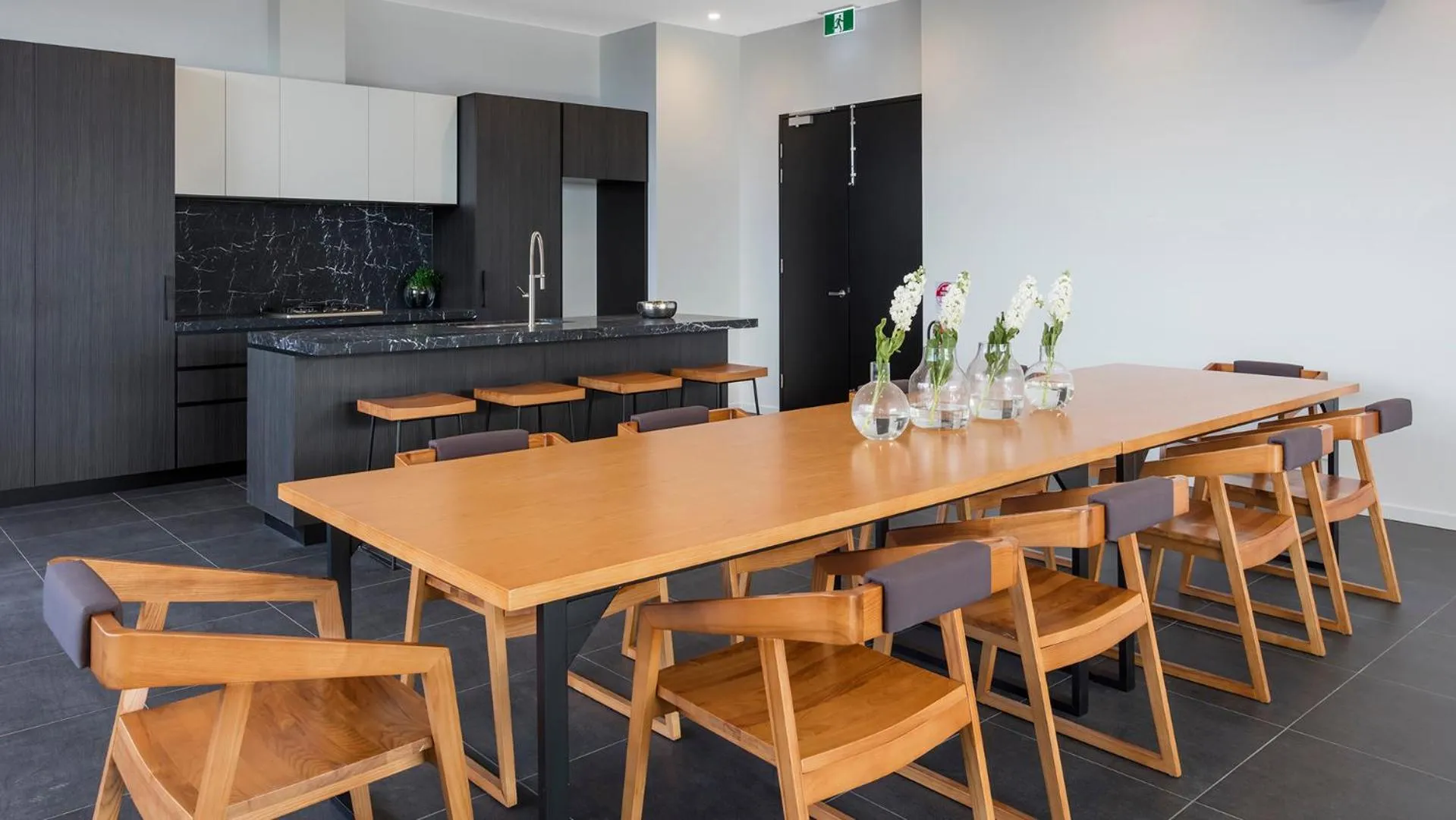Dining area in Avani Melbourne Box Hill Residences