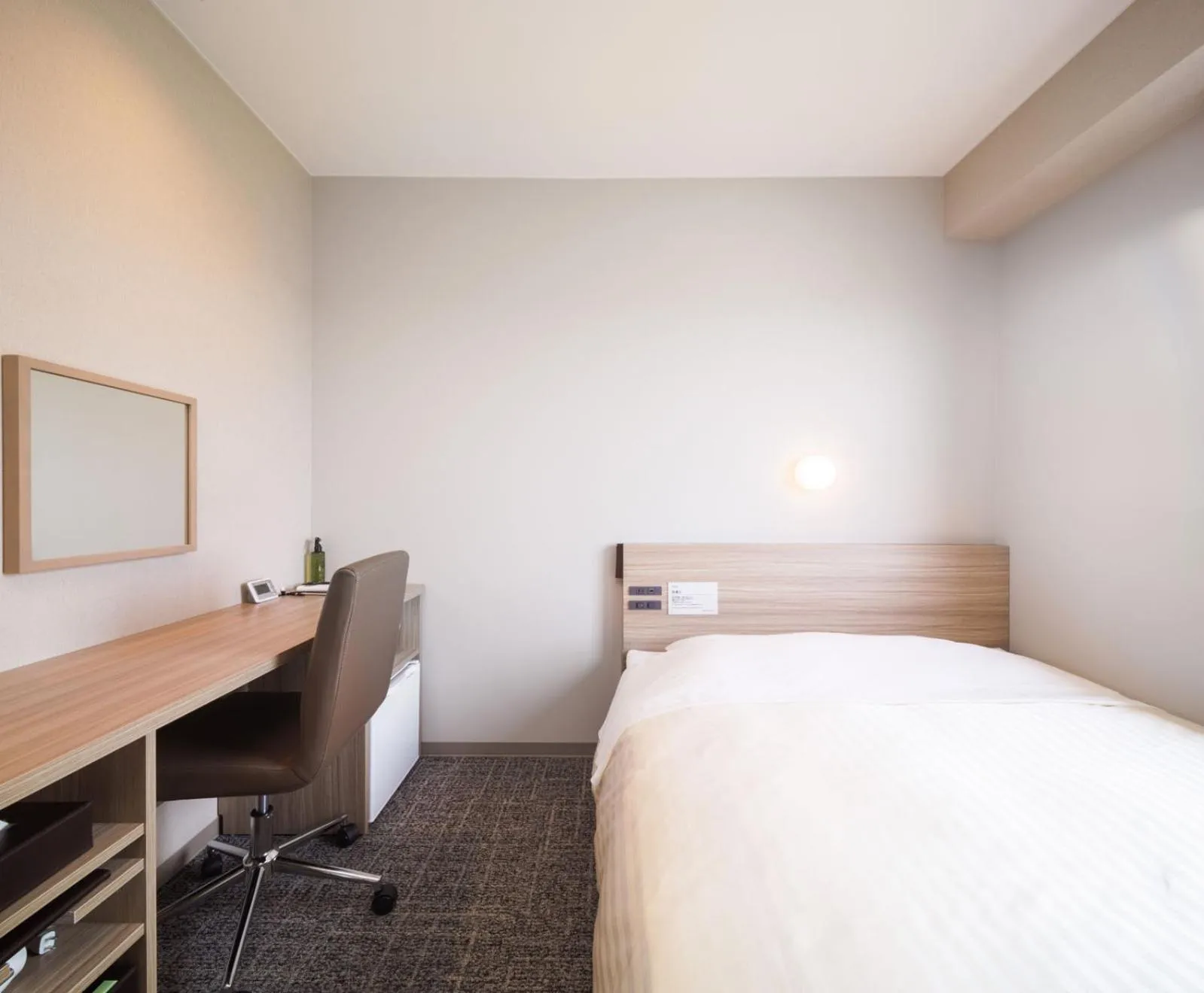 Bed in Super Hotel Anan Tomioka