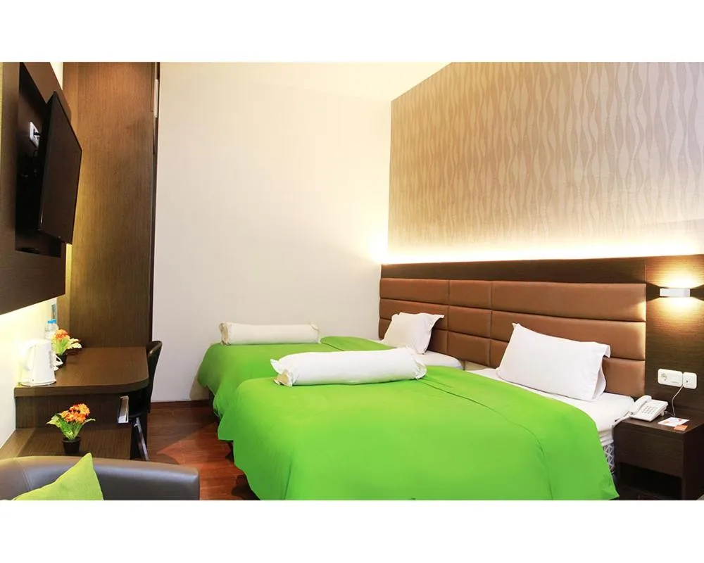 Bed in Emerald Hotel