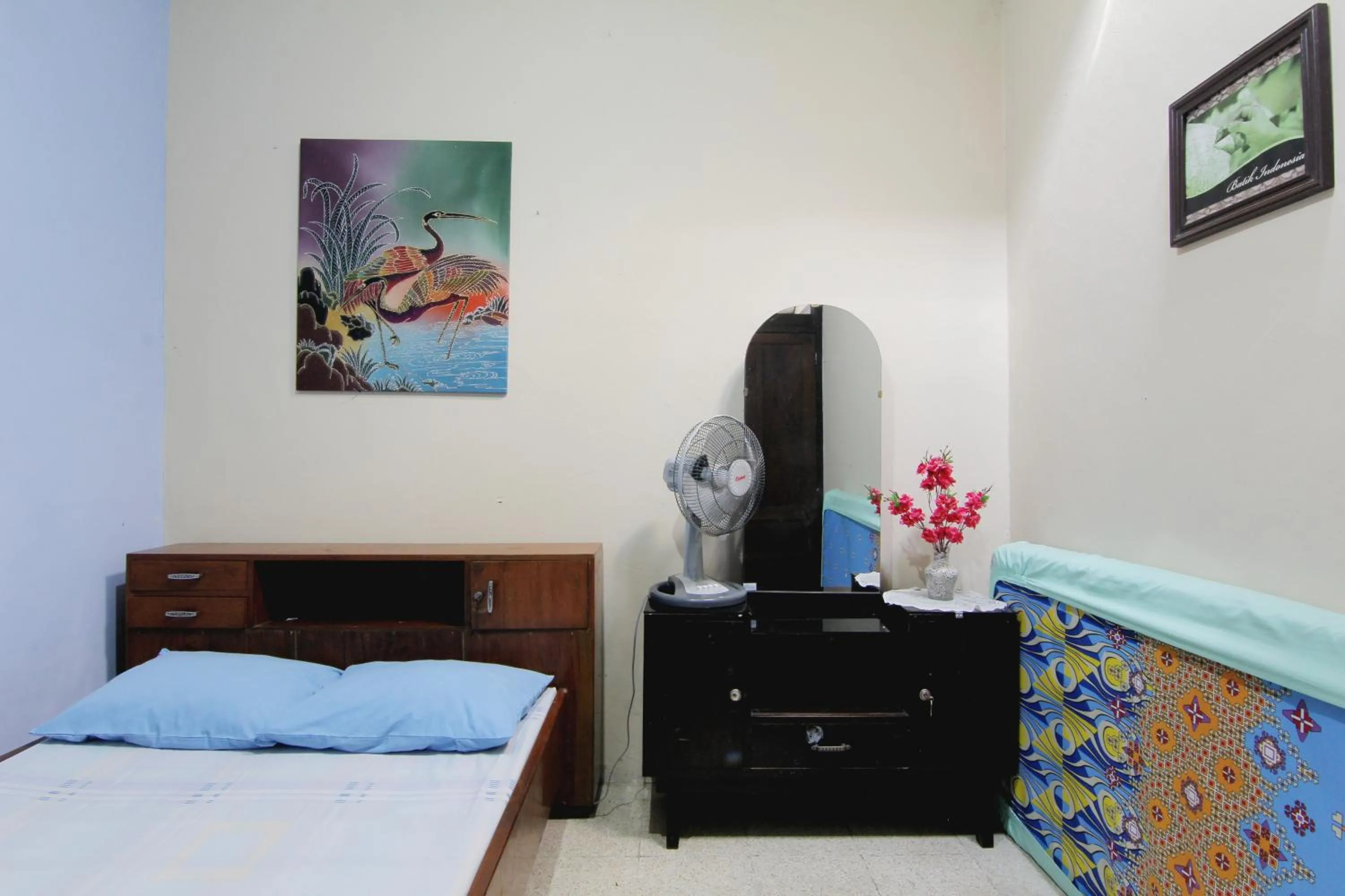 Bed in Batik Trinidar Homestay