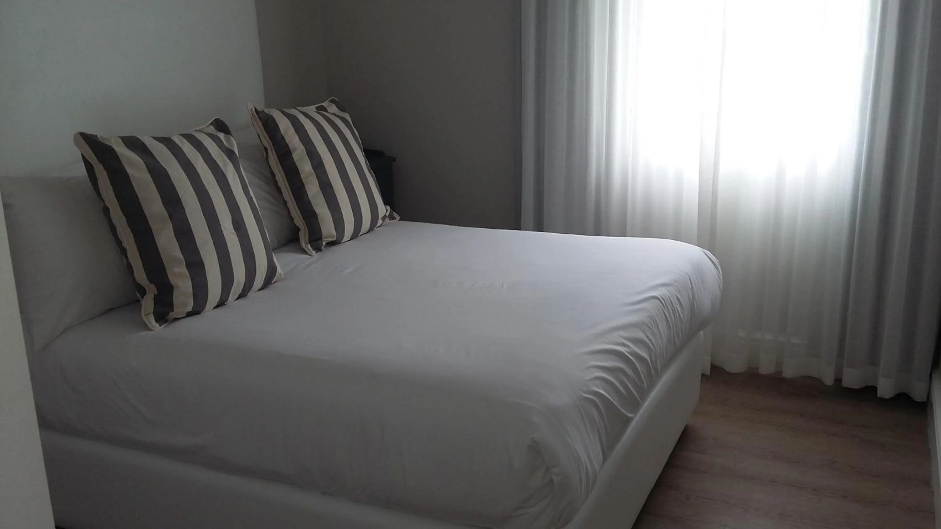 Bed in Beach Club Self Catering Apartments