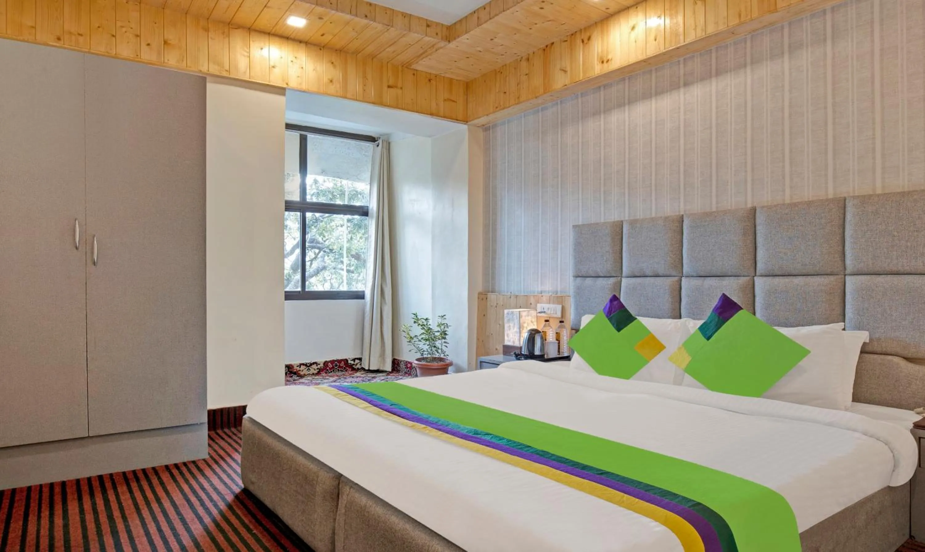 Bedroom in Treebo Kosmos Anamika, 1 Km From Nainital Lake