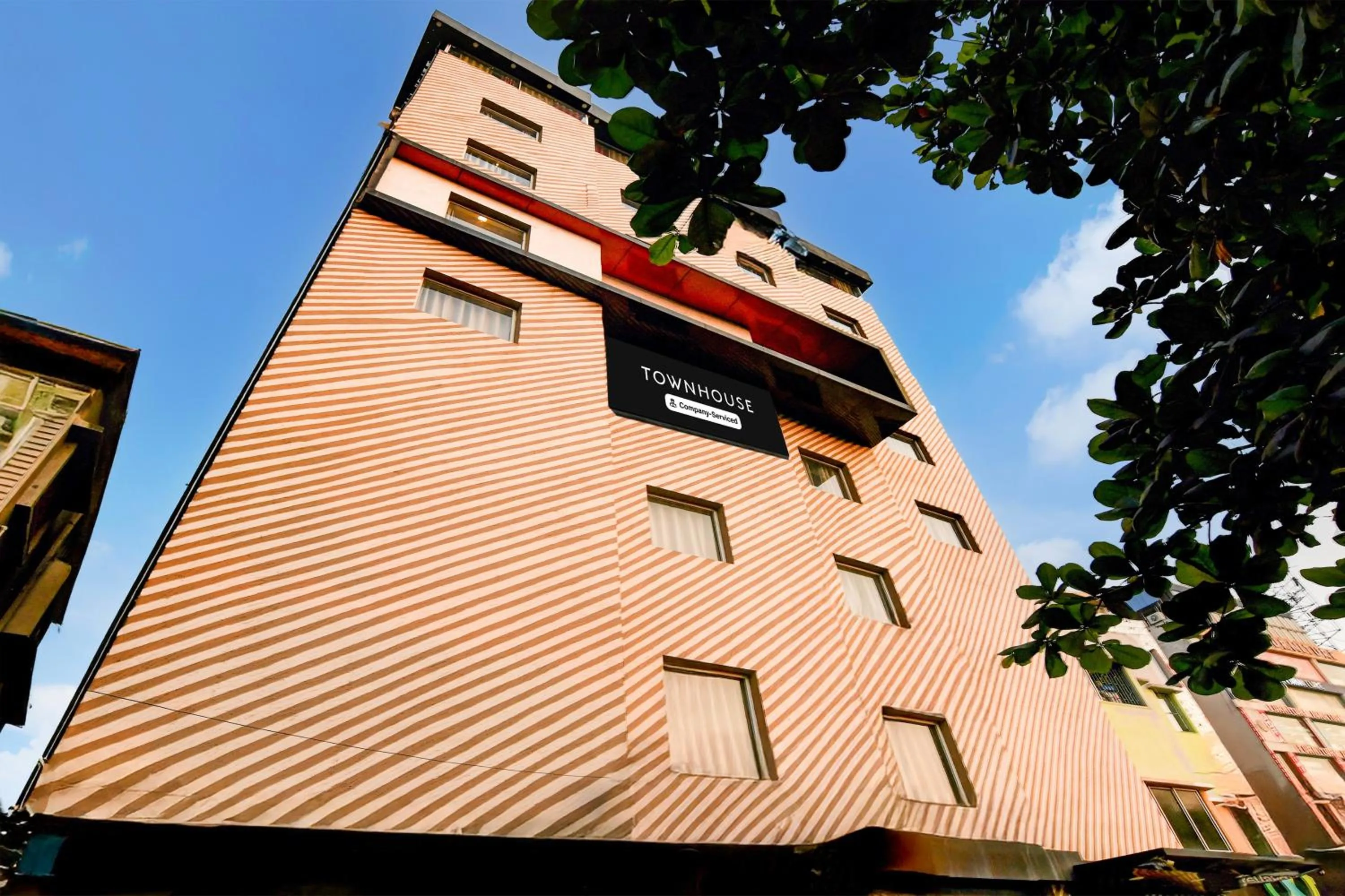 Facade/entrance in Super Townhouse VIP Road Formerly The Sky