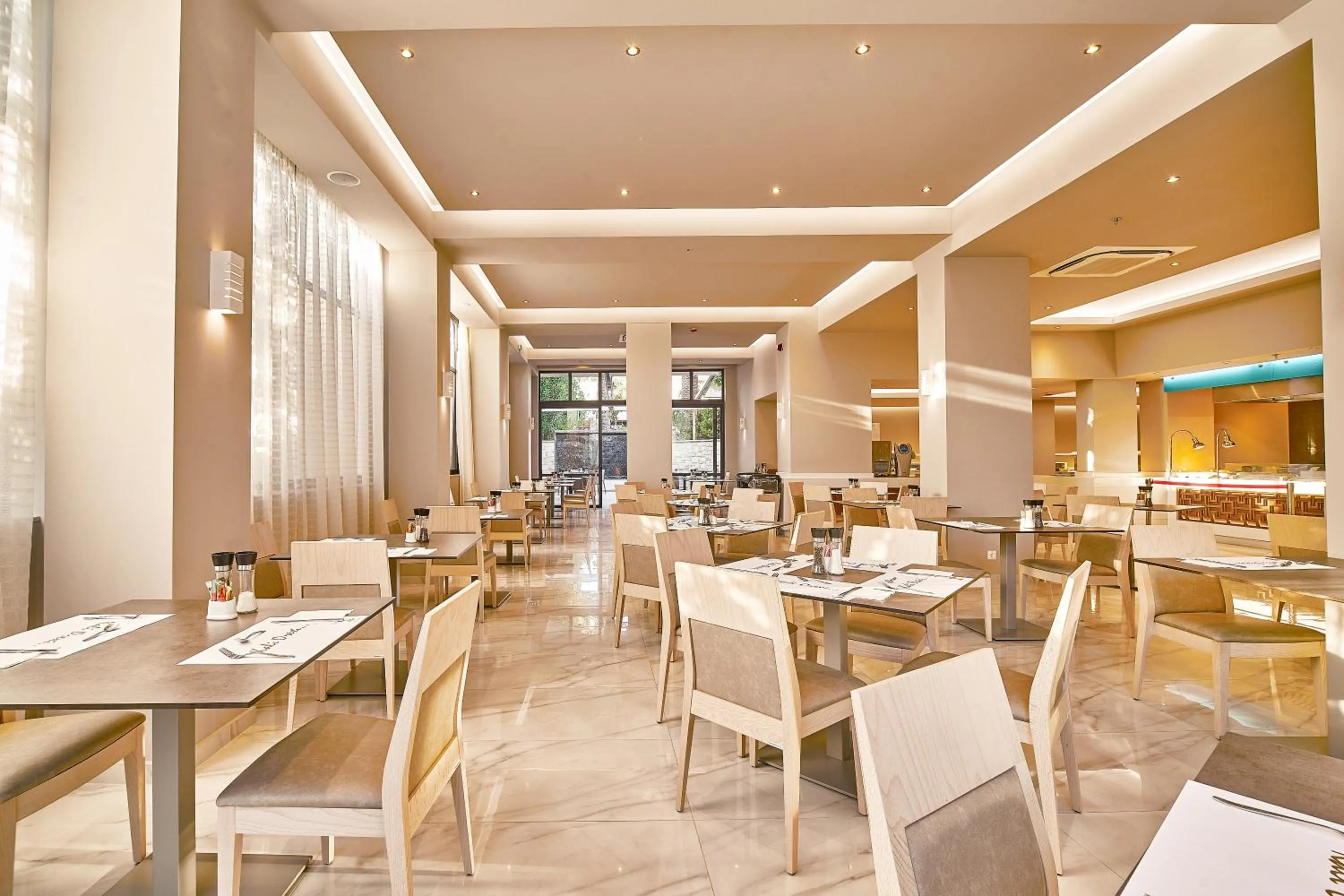 Restaurant/places to eat in Eva Bay Hotel On The Beach - Adults Only