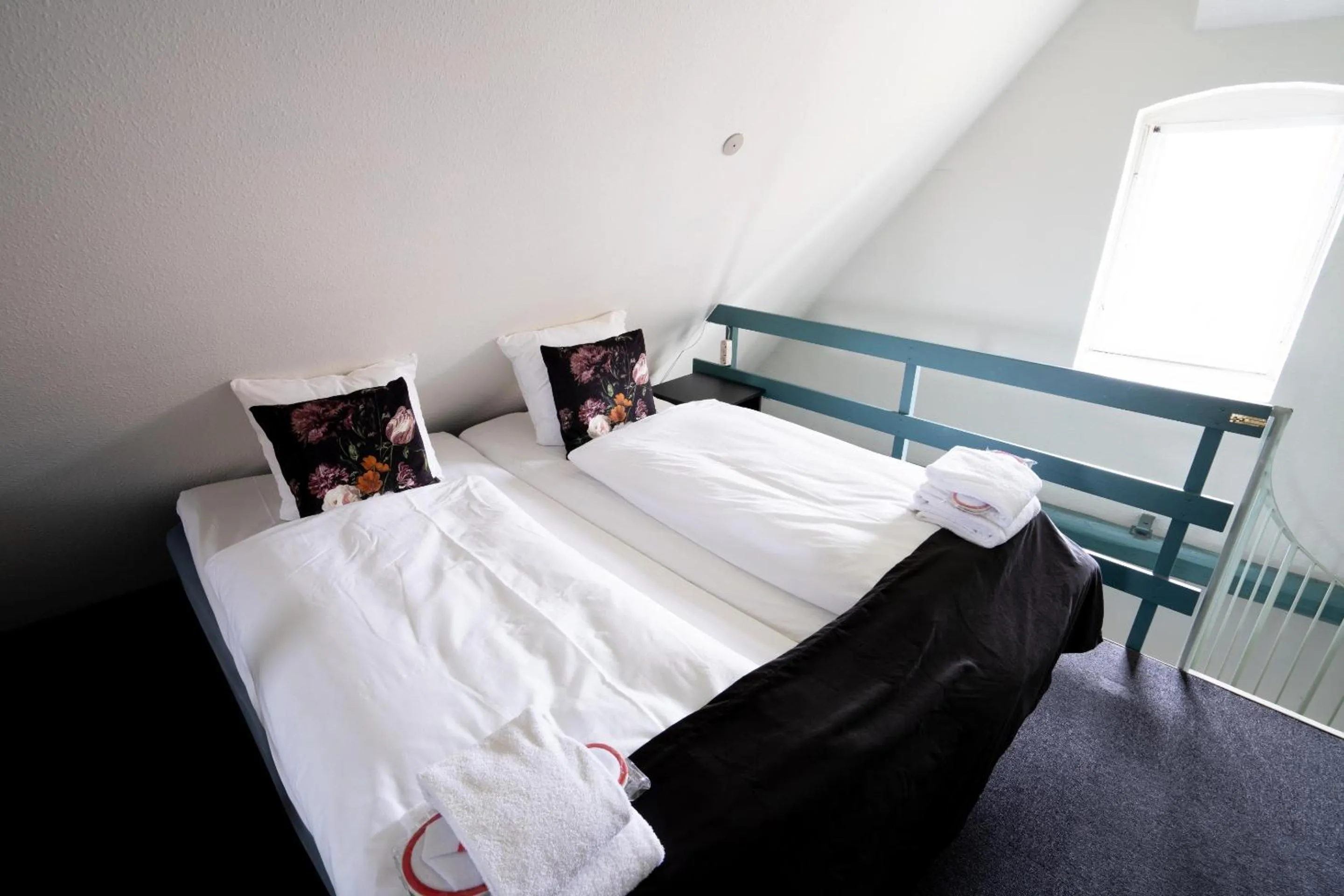 Bed in Hotel Vinhuset