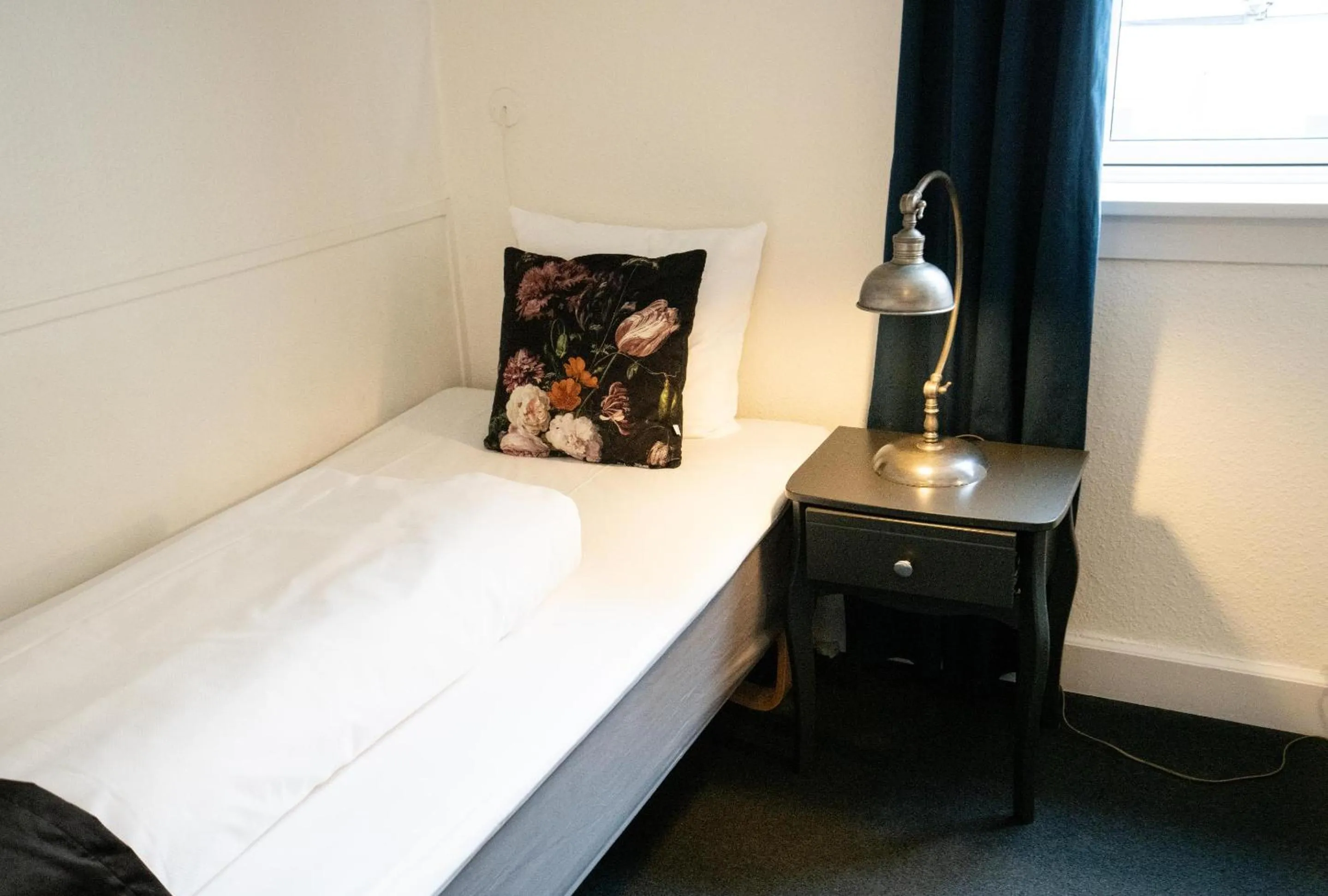 Bed in Hotel Vinhuset