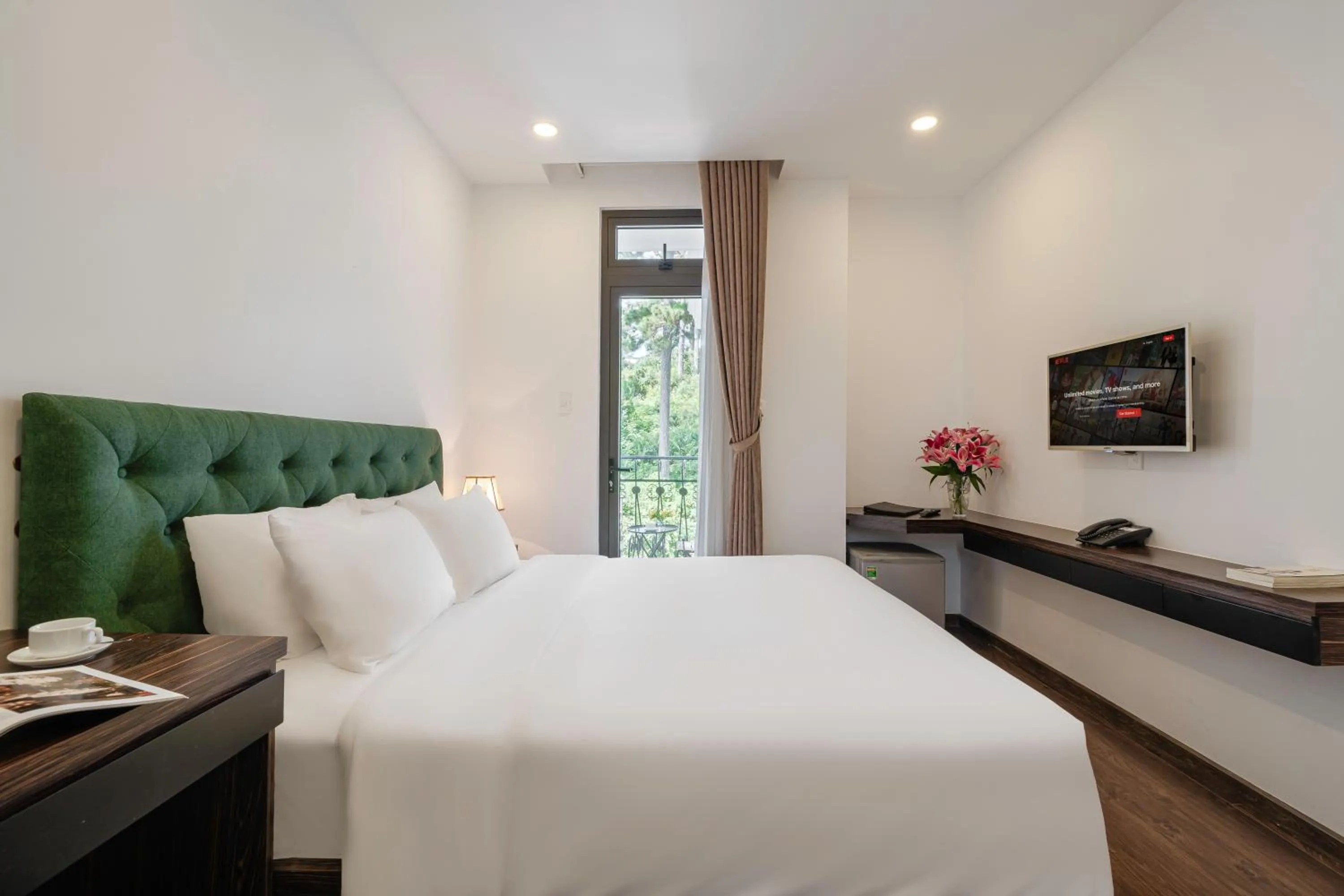 Bed in TTR Moonstone Apart Hotel