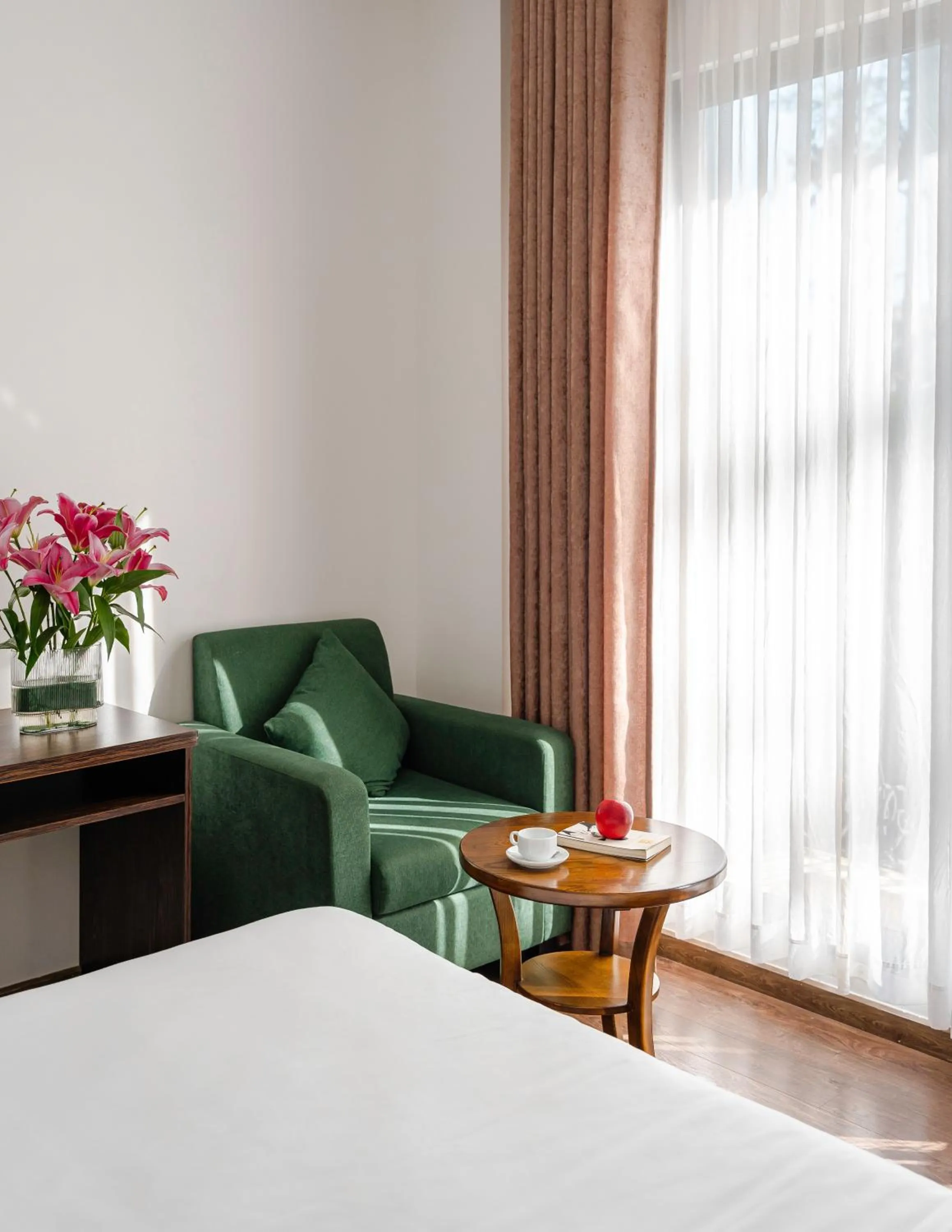 Bed in TTR Moonstone Apart Hotel