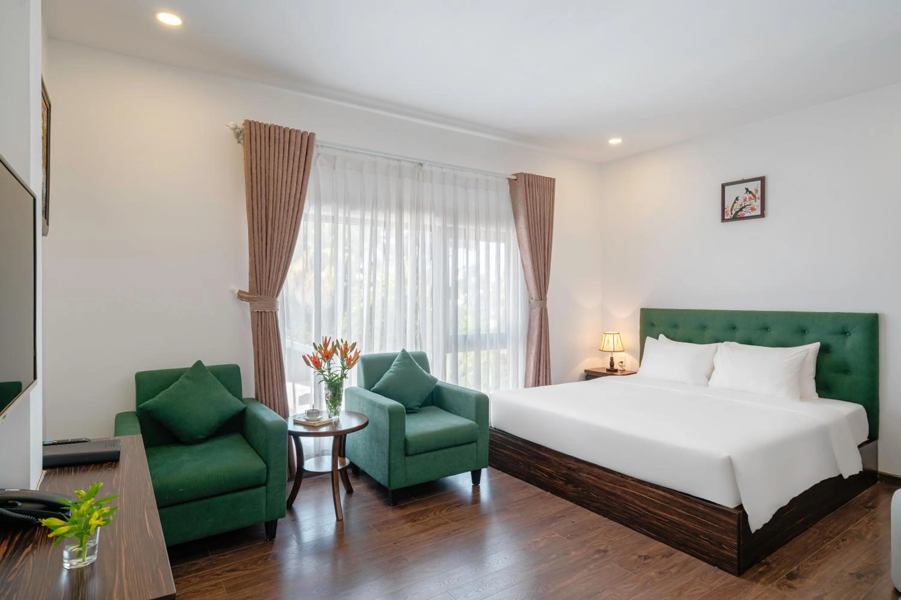 Bed in TTR Moonstone Apart Hotel