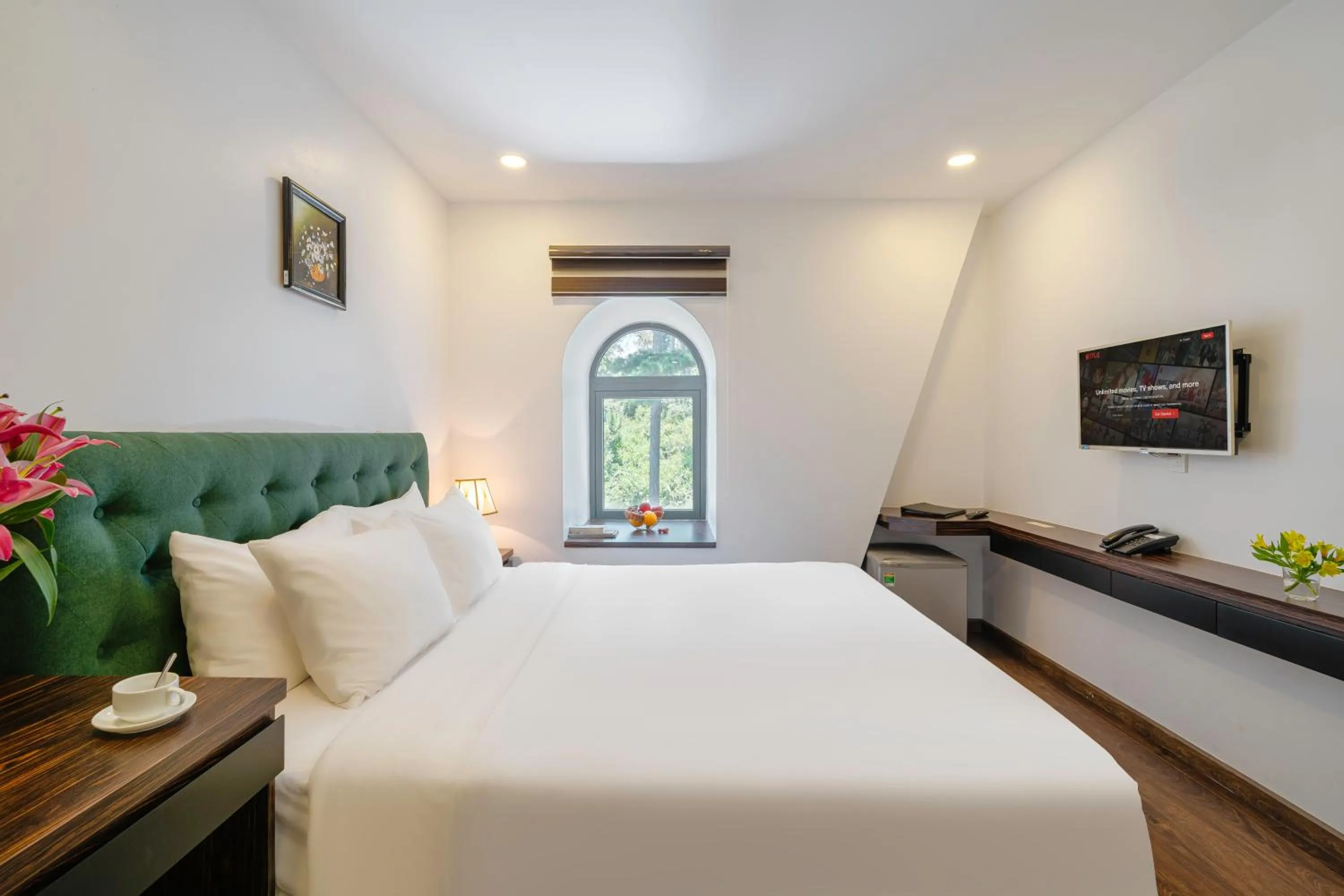 Bed in TTR Moonstone Apart Hotel