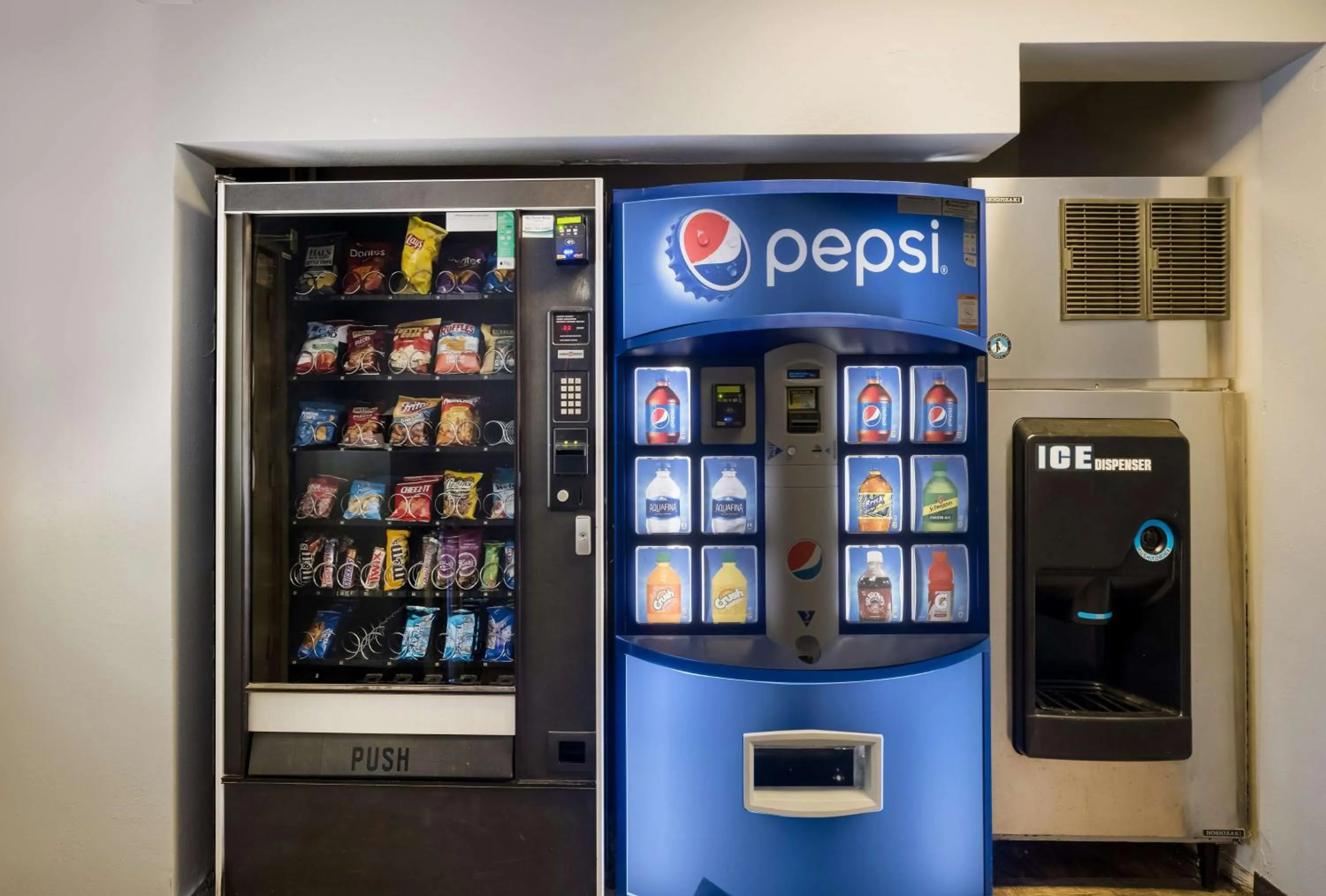 Property building in SureStay Plus by Best Western Woodbury Inn