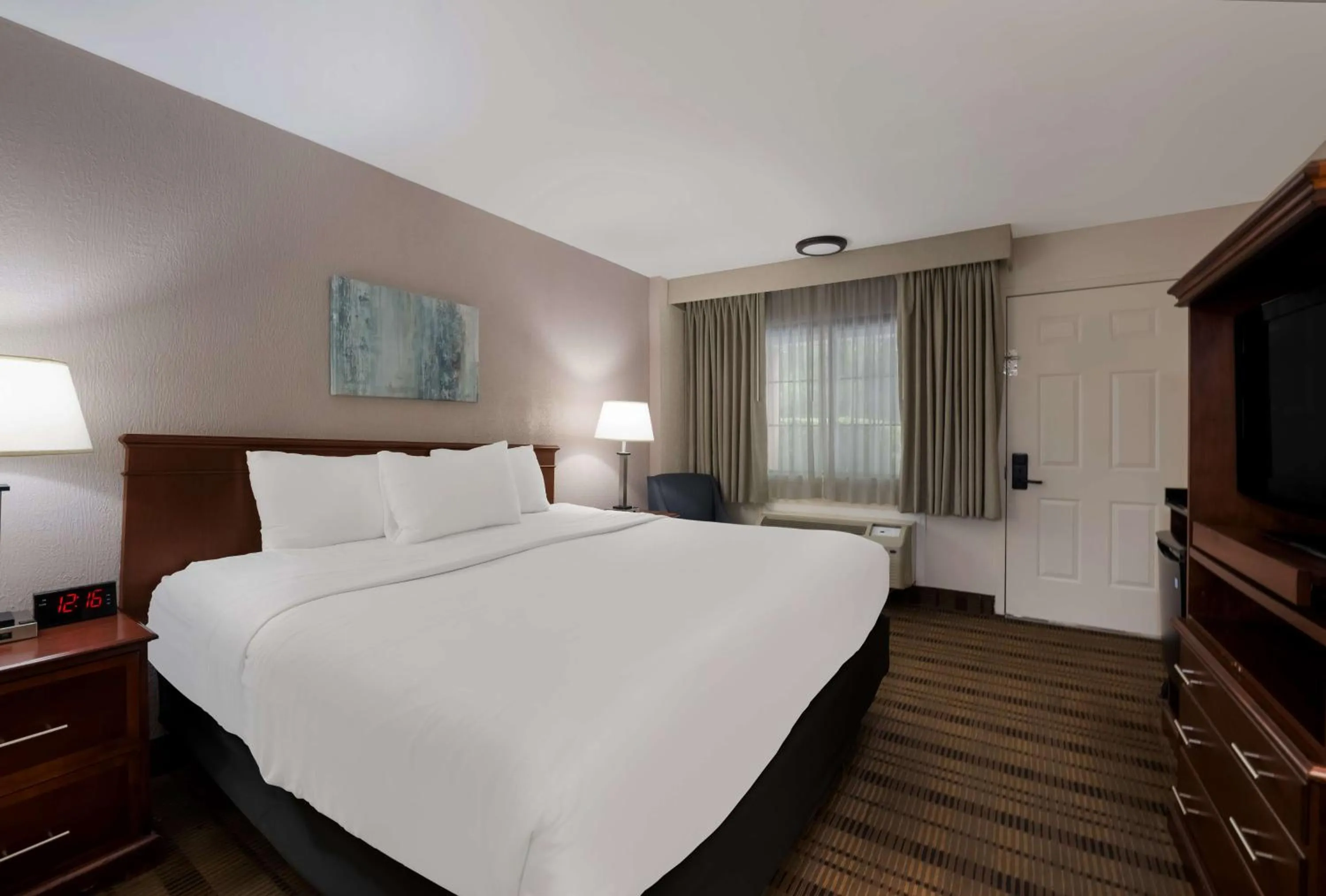 Bedroom, Bed in SureStay Plus by Best Western Woodbury Inn