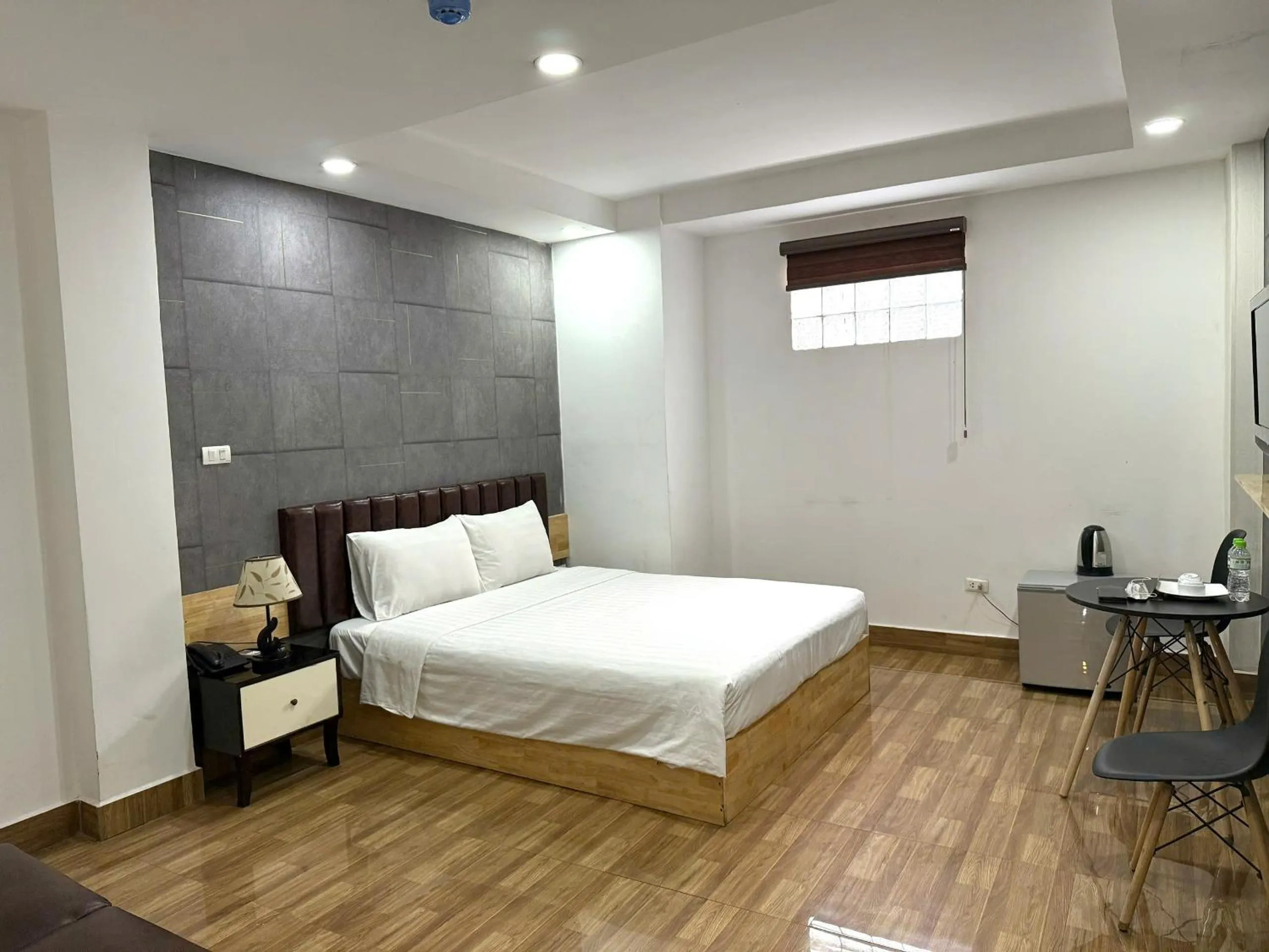 Bed in Holiday Suites Hotel & Spa