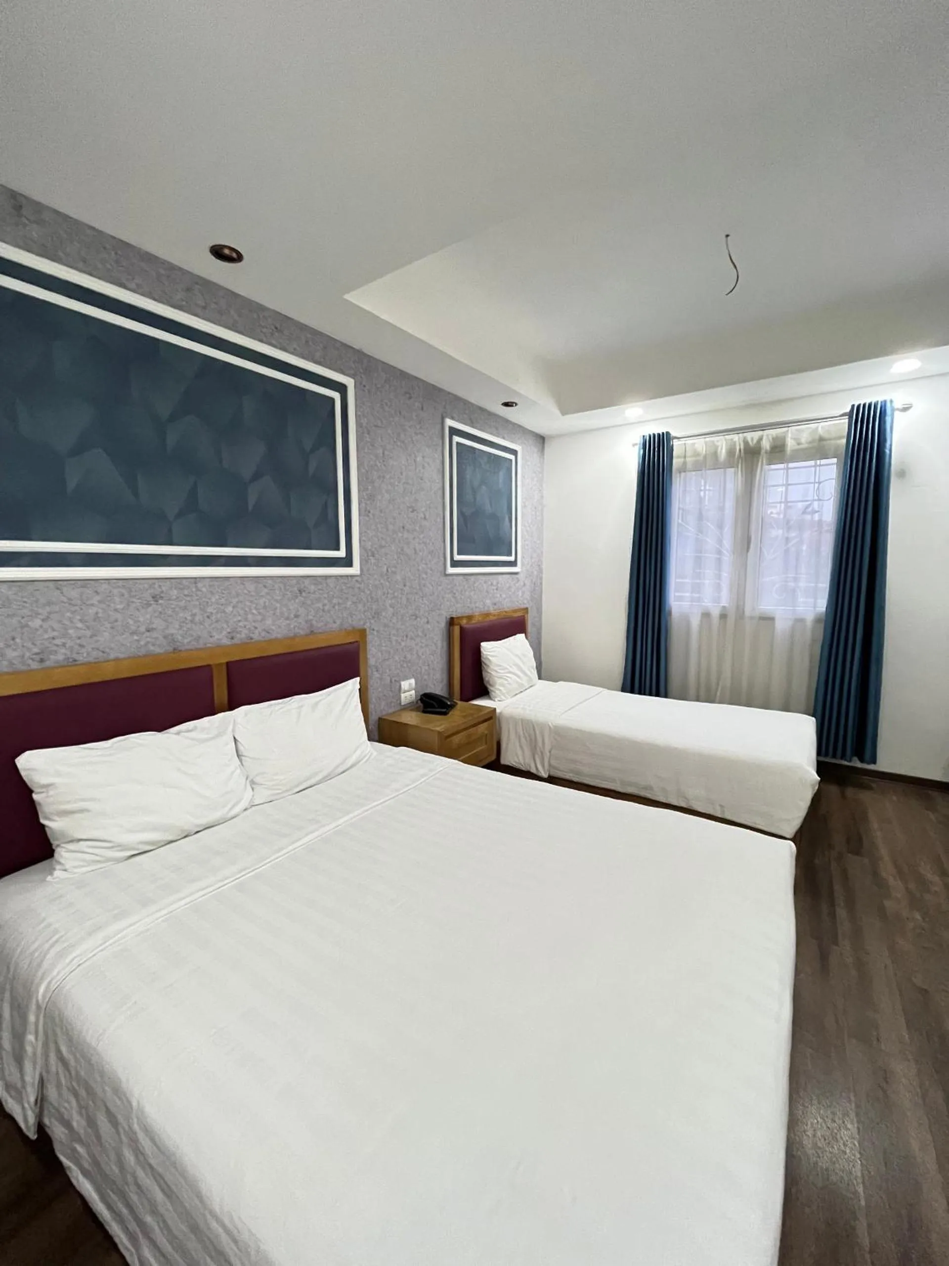 Bed in Holiday Suites Hotel & Spa