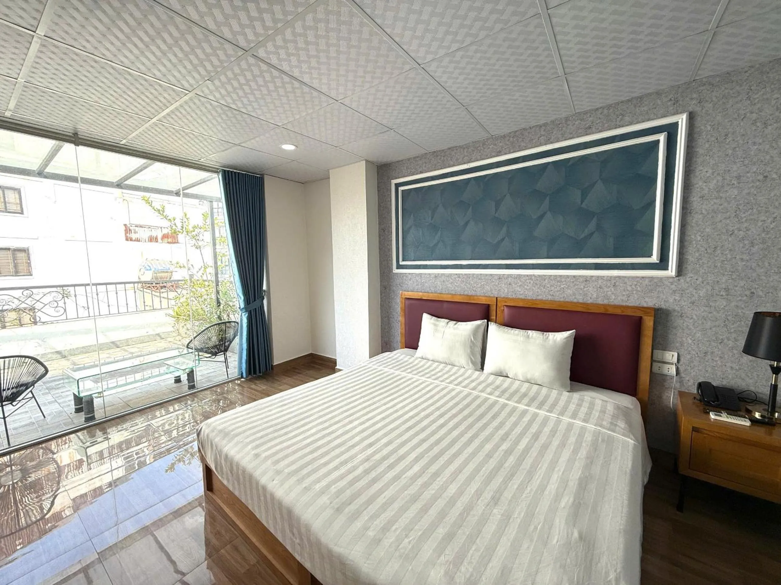 Bed in Holiday Suites Hotel & Spa