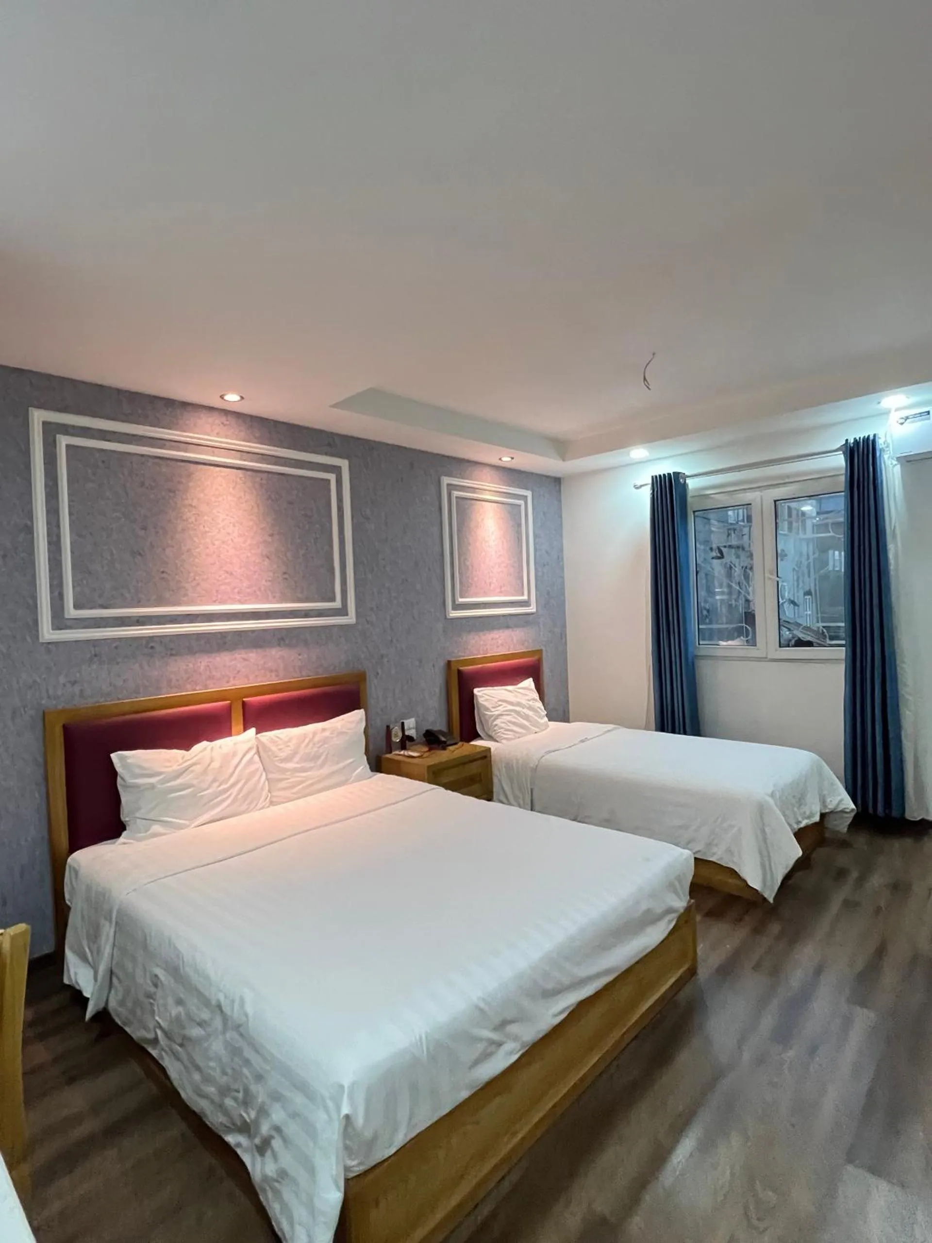 Bed in Holiday Suites Hotel & Spa