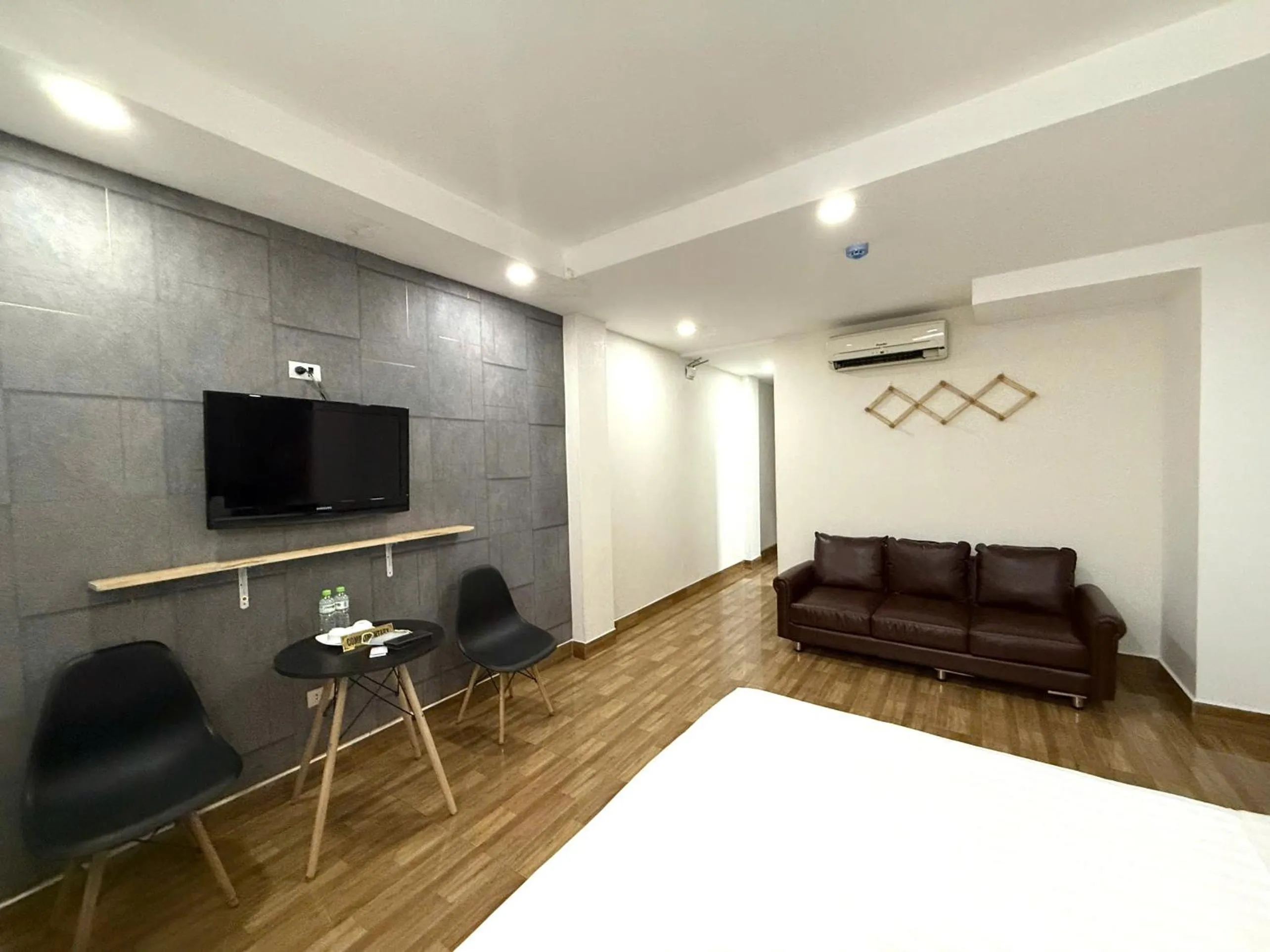 Bed in Holiday Suites Hotel & Spa