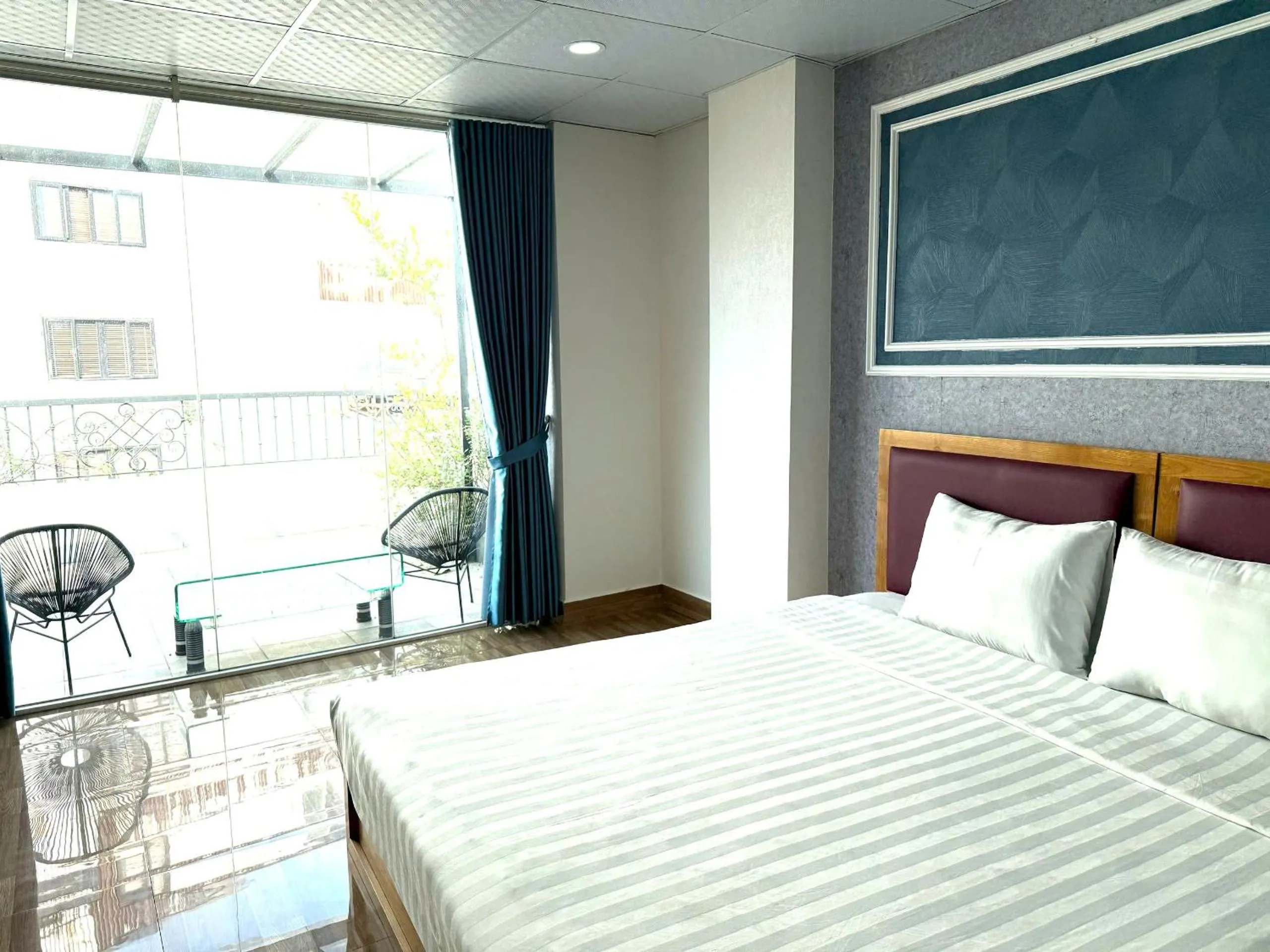 Bed in Holiday Suites Hotel & Spa