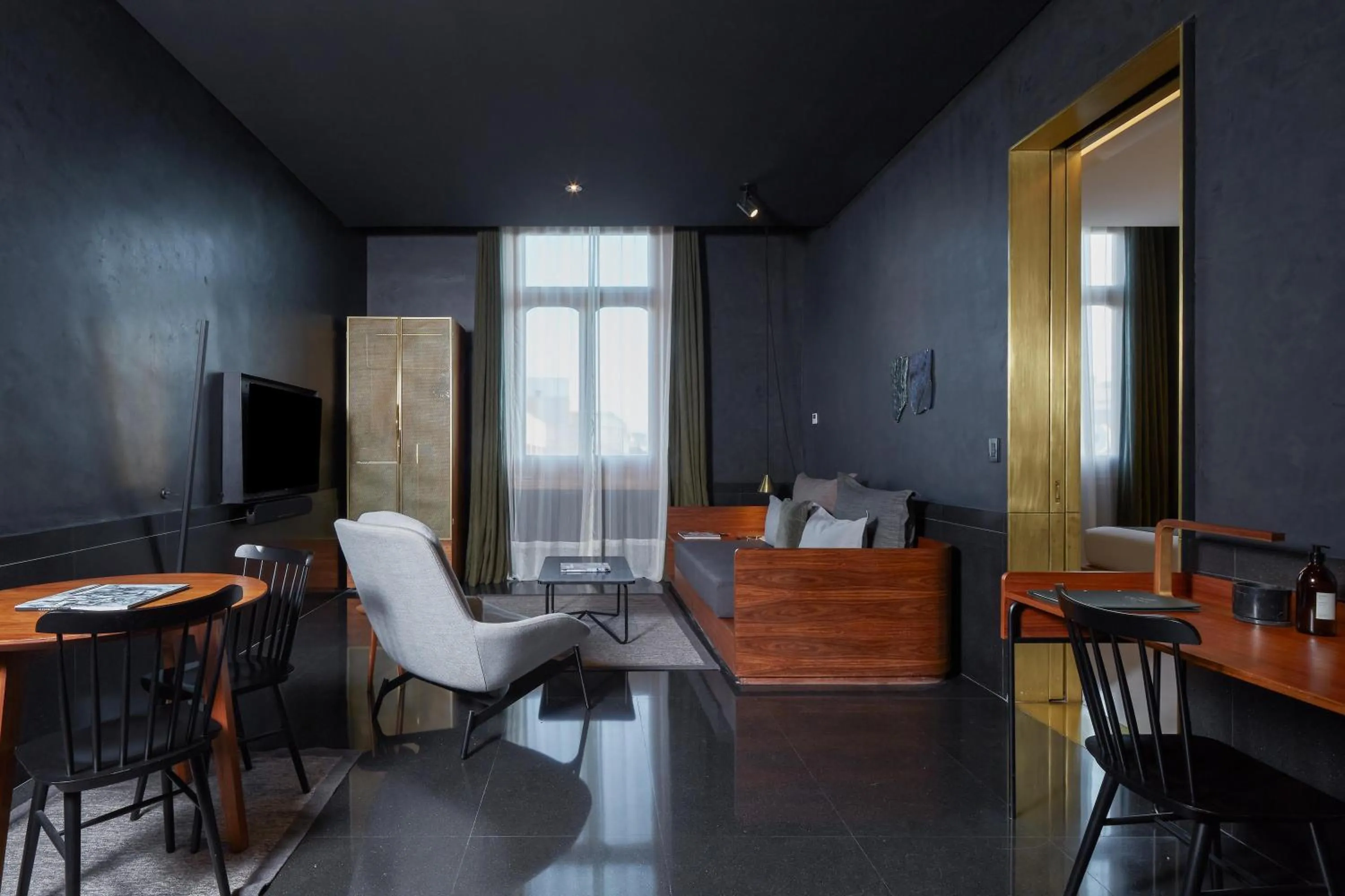 Living room in Umbral, Curio Collection By Hilton