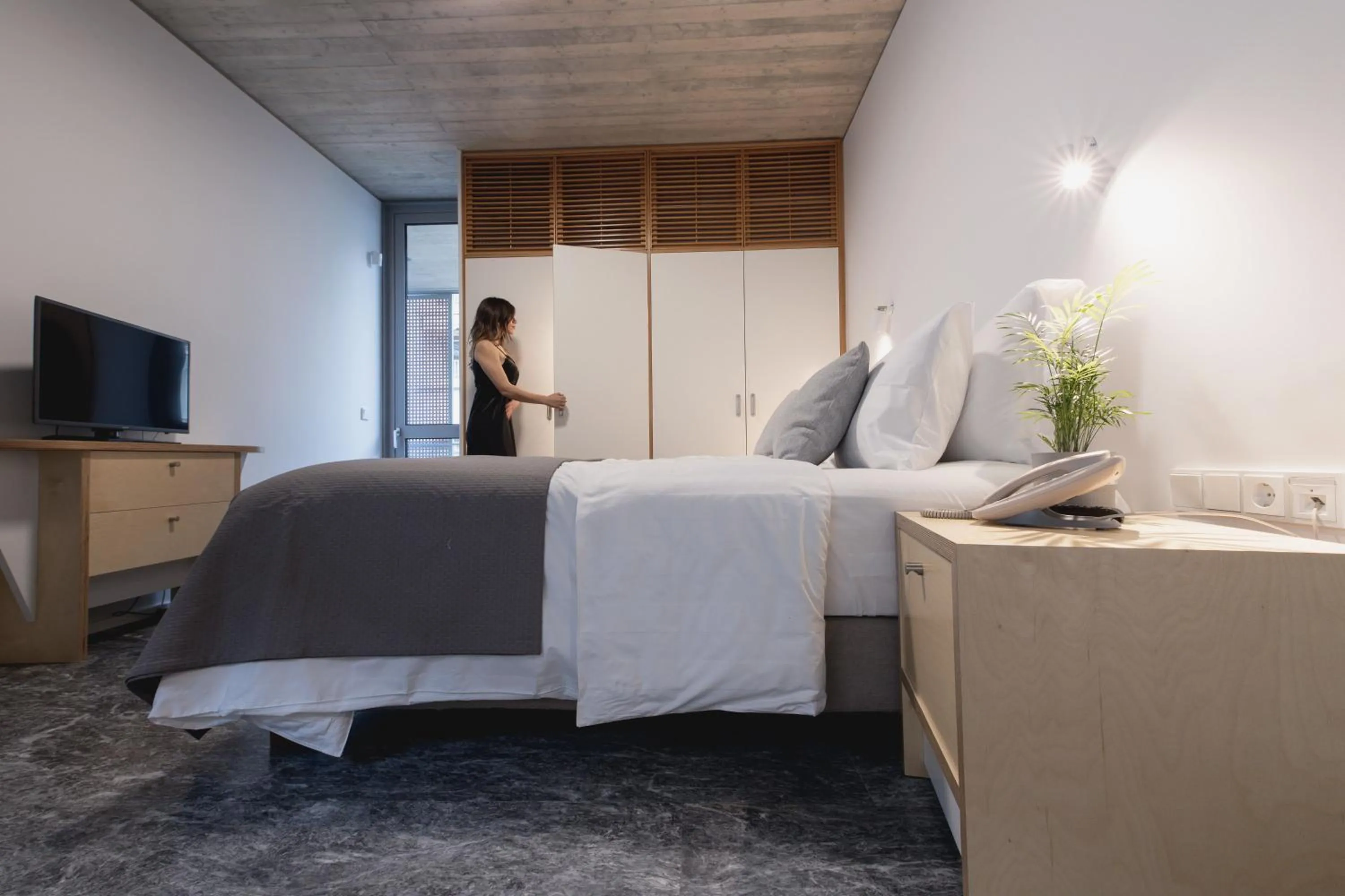 Photo of the whole room, Bed in Athens BlueBuilding