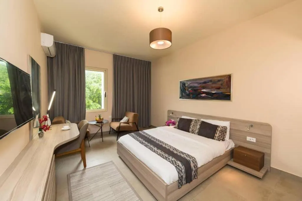 Bed in Roots Hotel Apartments Abidjan