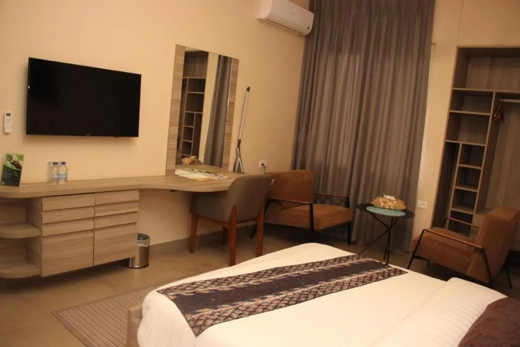 Bed in Roots Hotel Apartments Abidjan