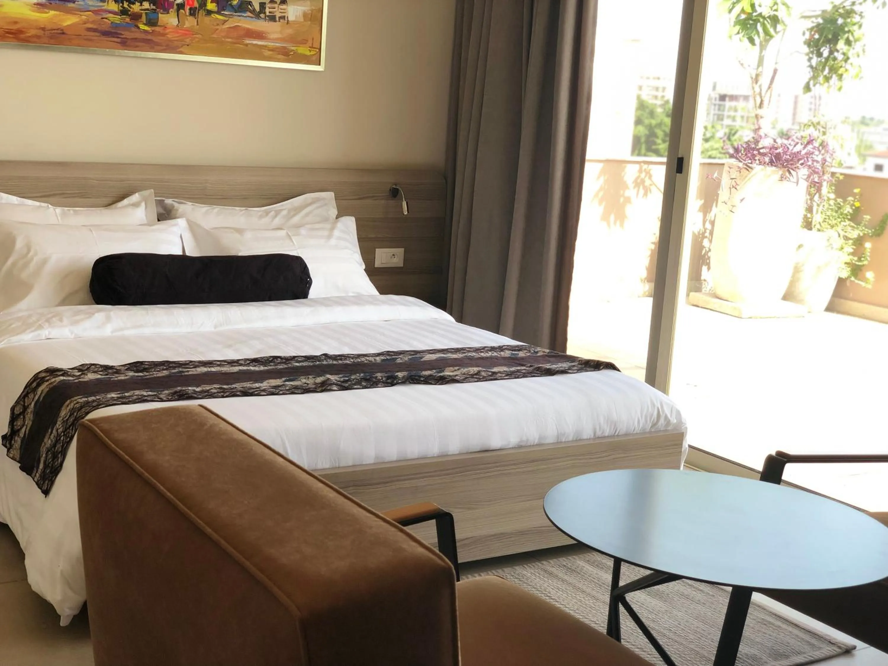 Bed in Roots Hotel Apartments Abidjan
