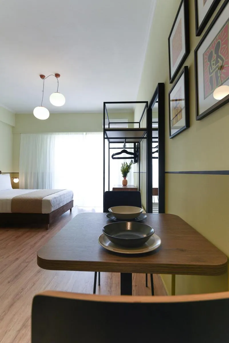 Seating area, Bed in ATHENS STORIES