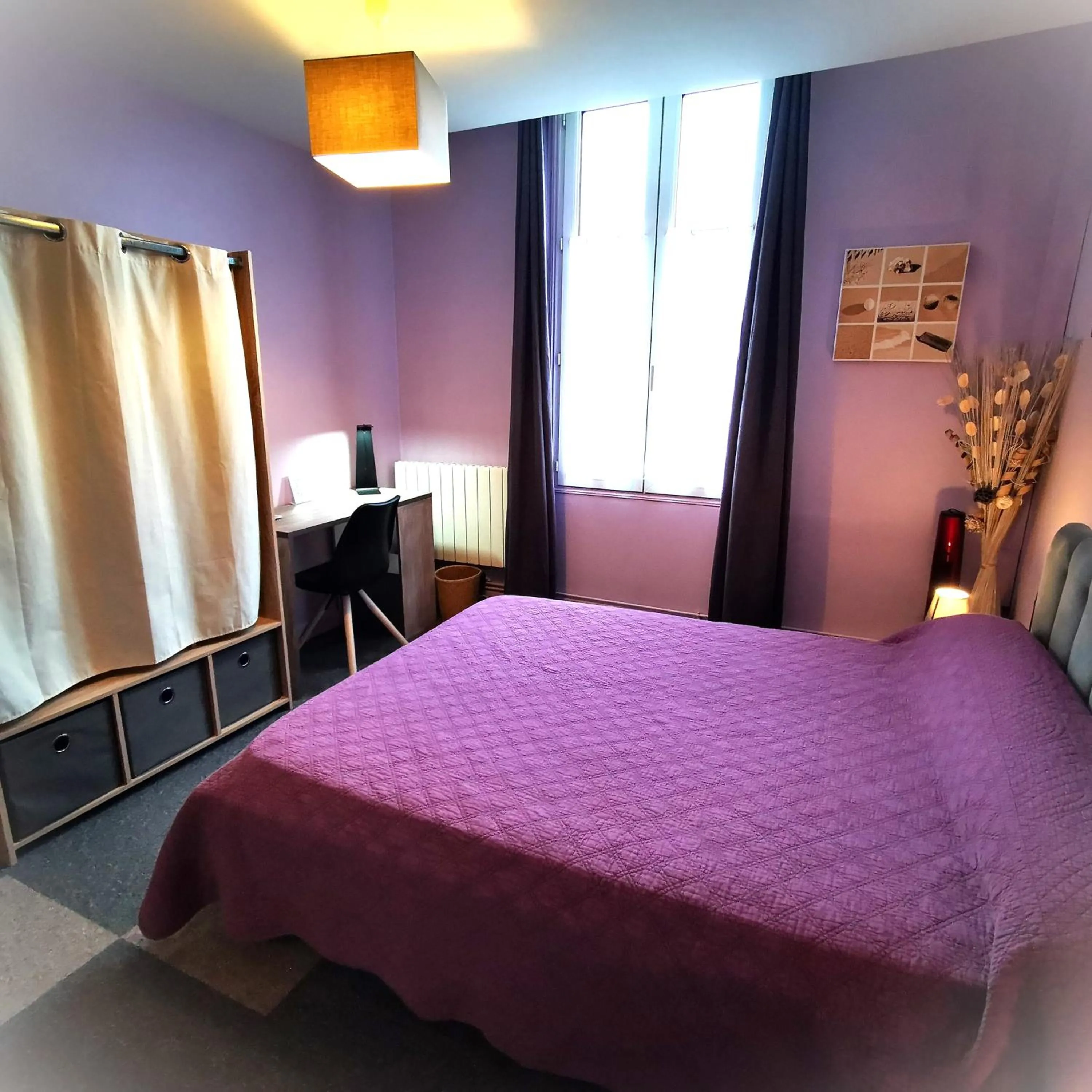 Bed in Logis Hôtel & Restaurant Le Saint Savinien