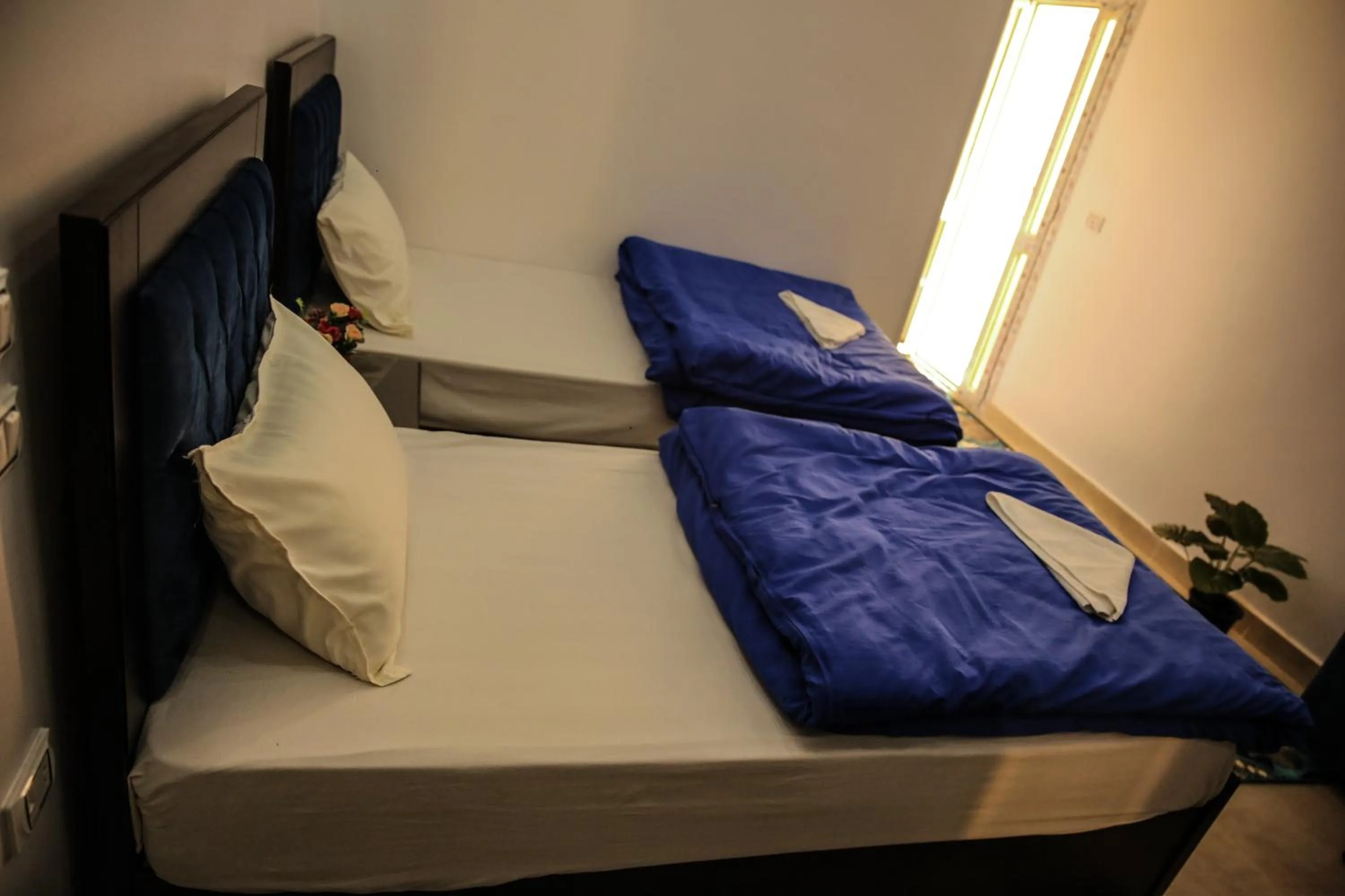 Bed in Queen Pyramids View Inn