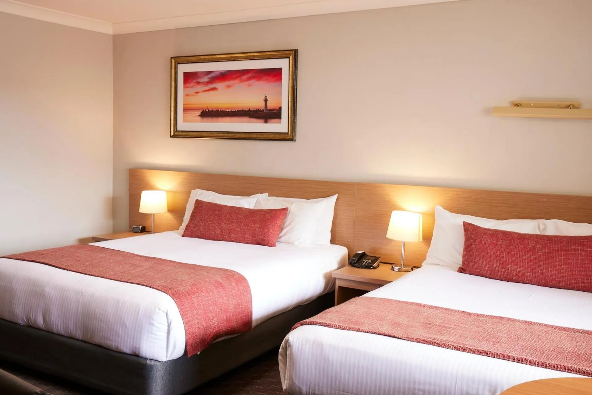 Bed in Ramada Hotel & Suites by Wyndham Cabramatta