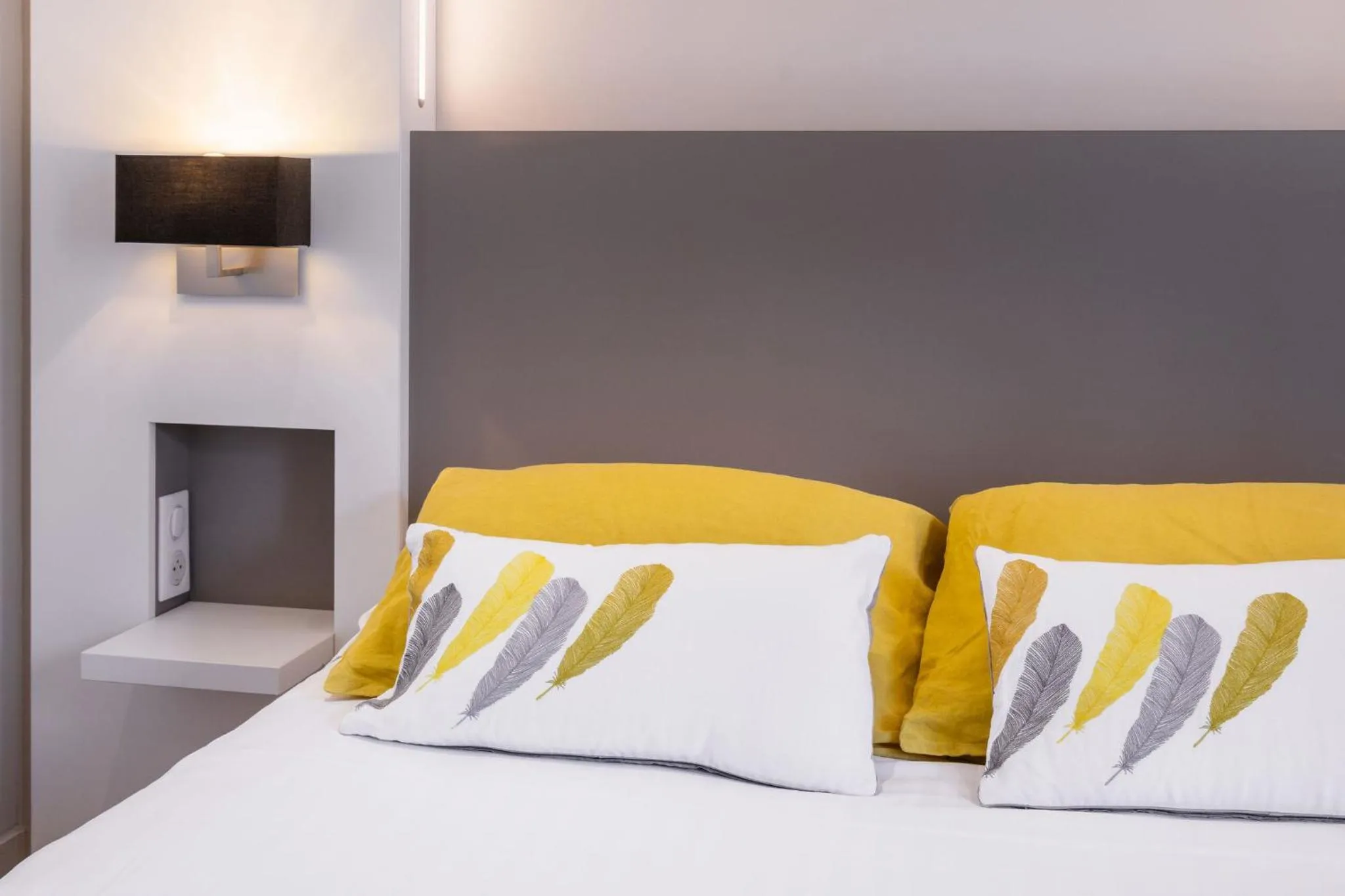 Bed in Le Cornouaille Hotel & Spa