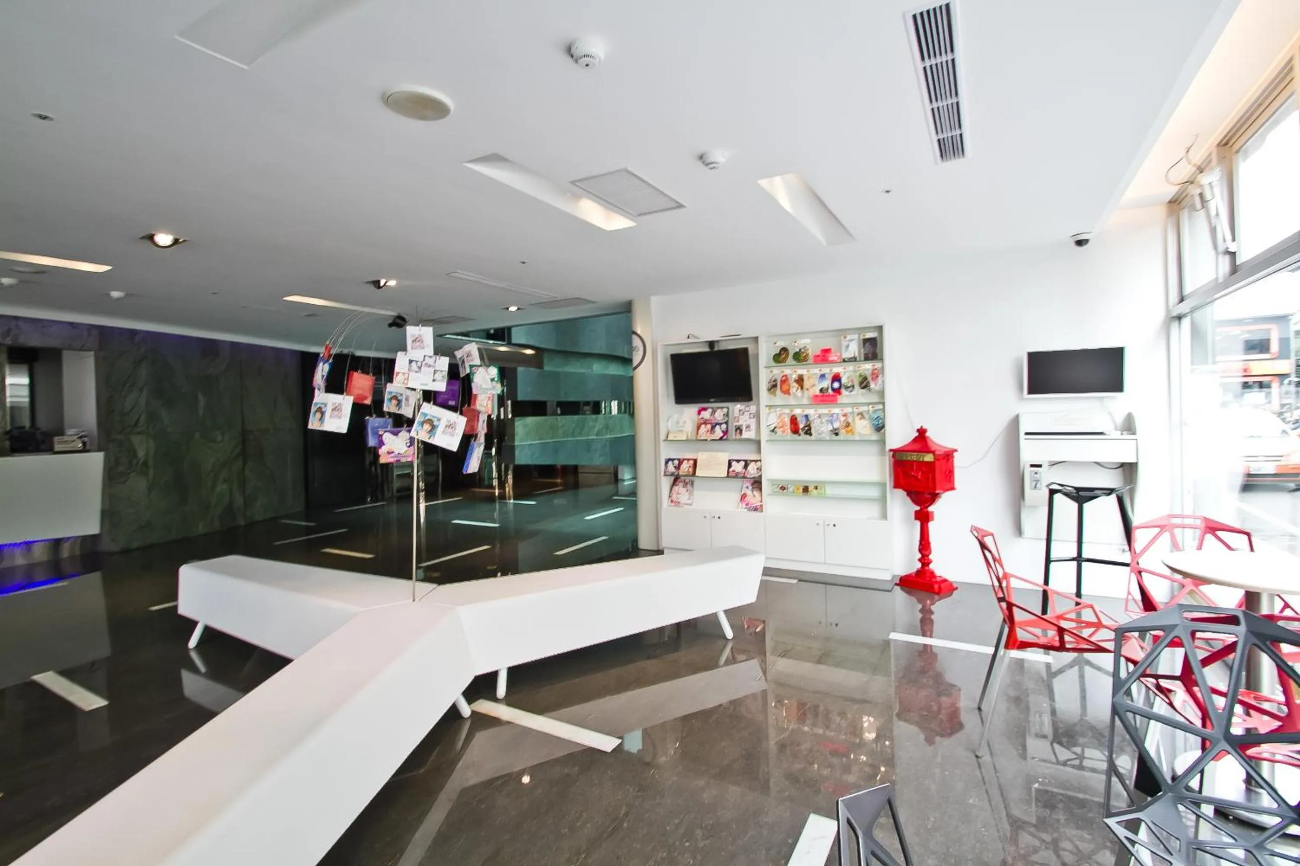 Communal lounge/ TV room in HOTEL HI - Xinmin