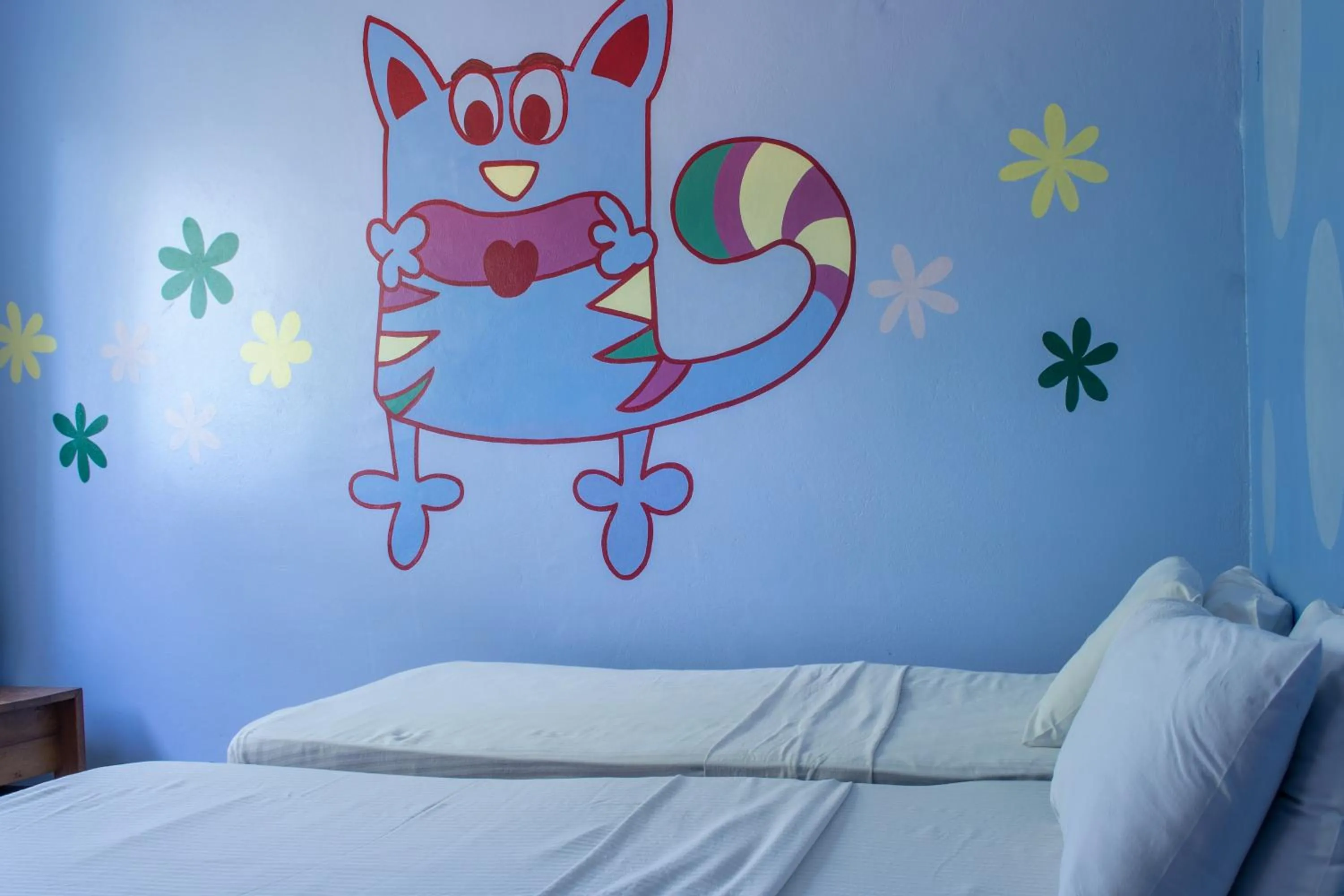 Bedroom, Bed in Cowrie Shell Beach Apartments Official