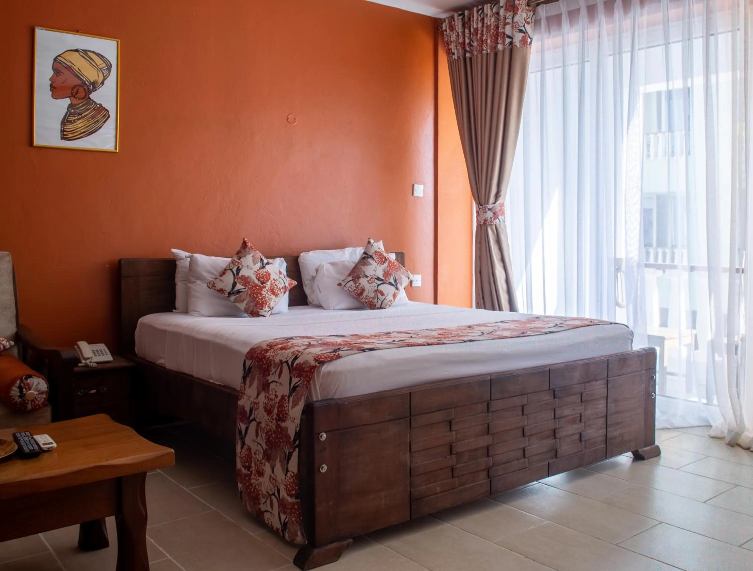 Bed in Cowrie Shell Beach Apartments Official