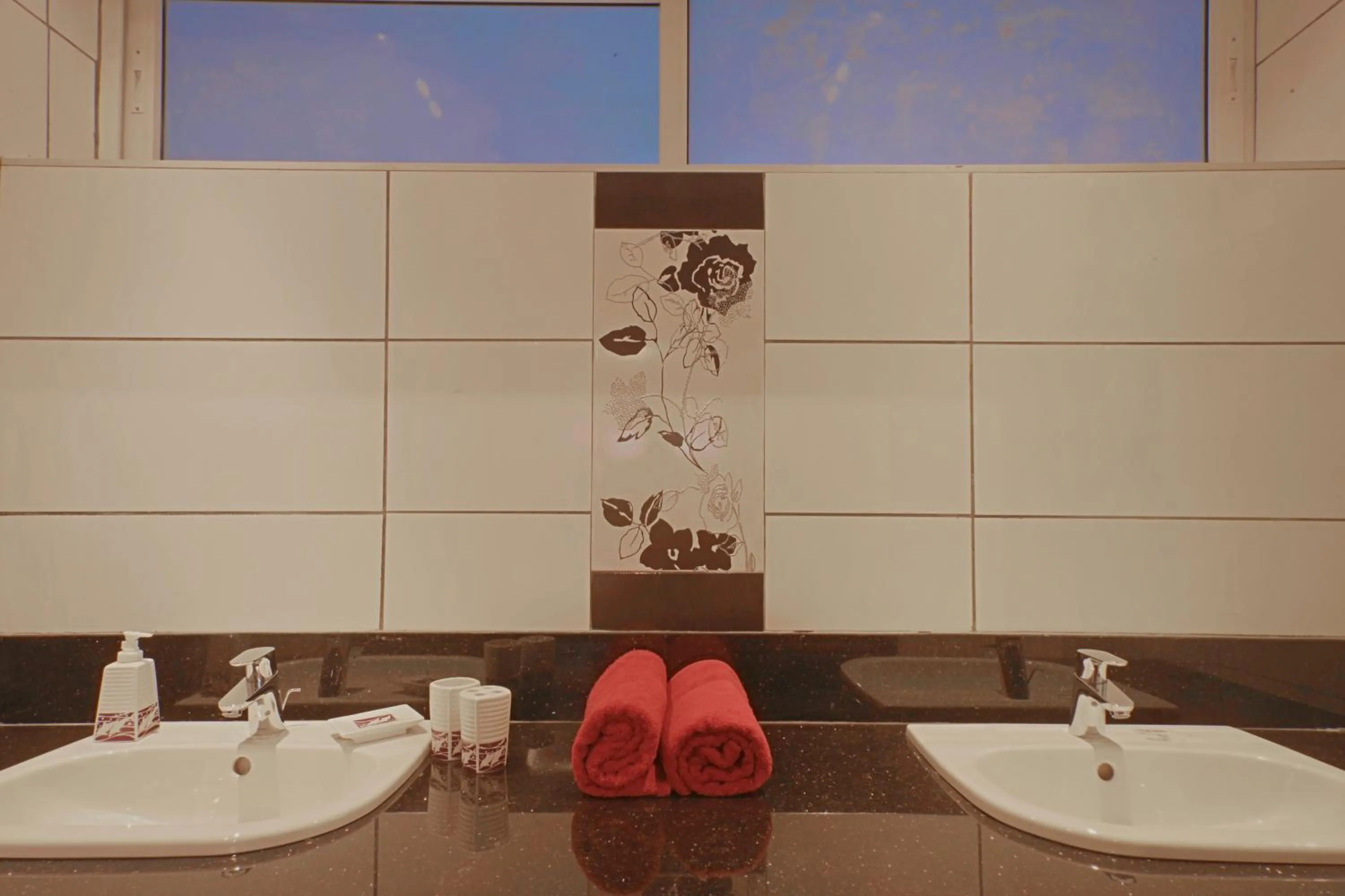 Bathroom in Cowrie Shell Beach Apartments Official