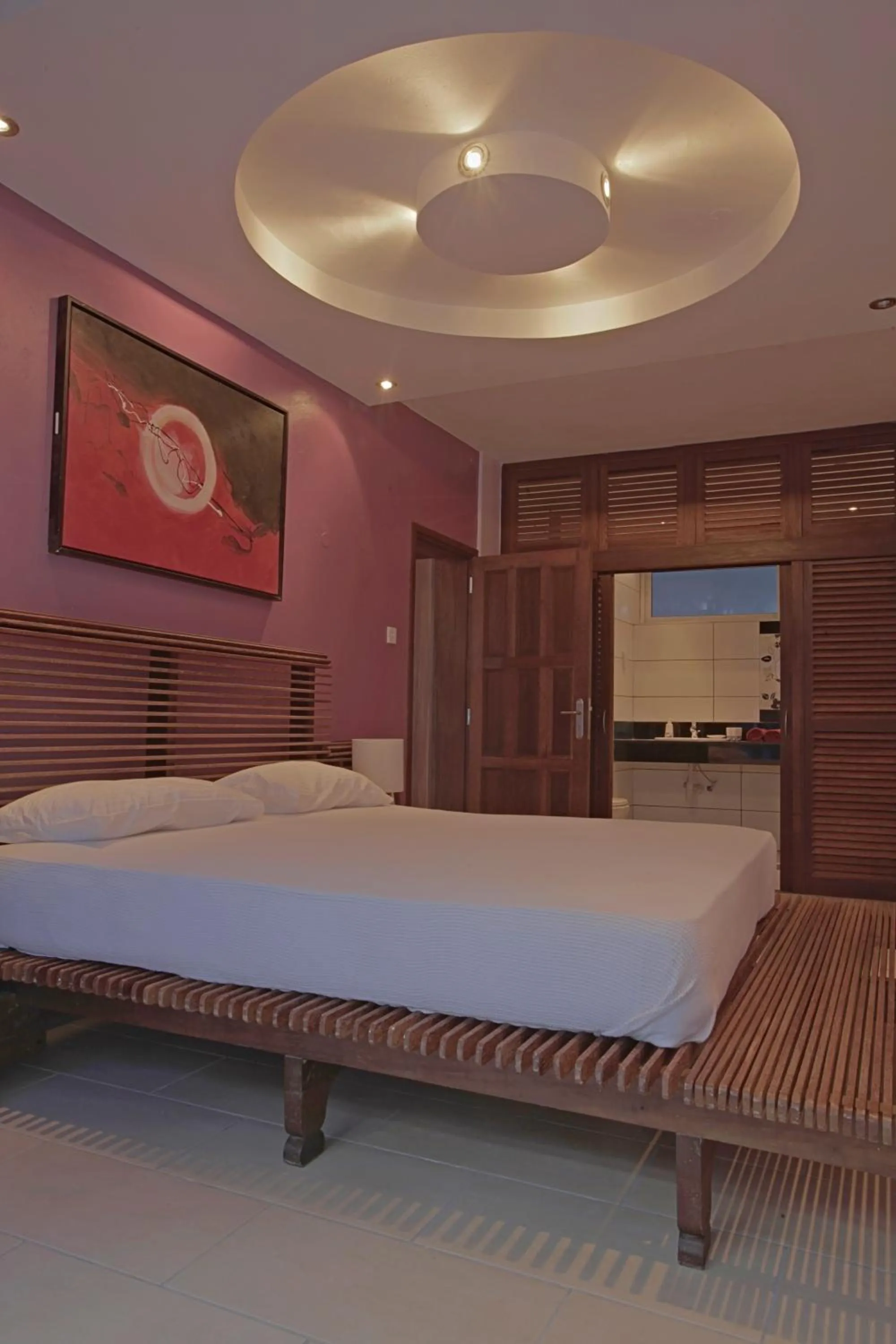 Bedroom, Bed in Cowrie Shell Beach Apartments Official