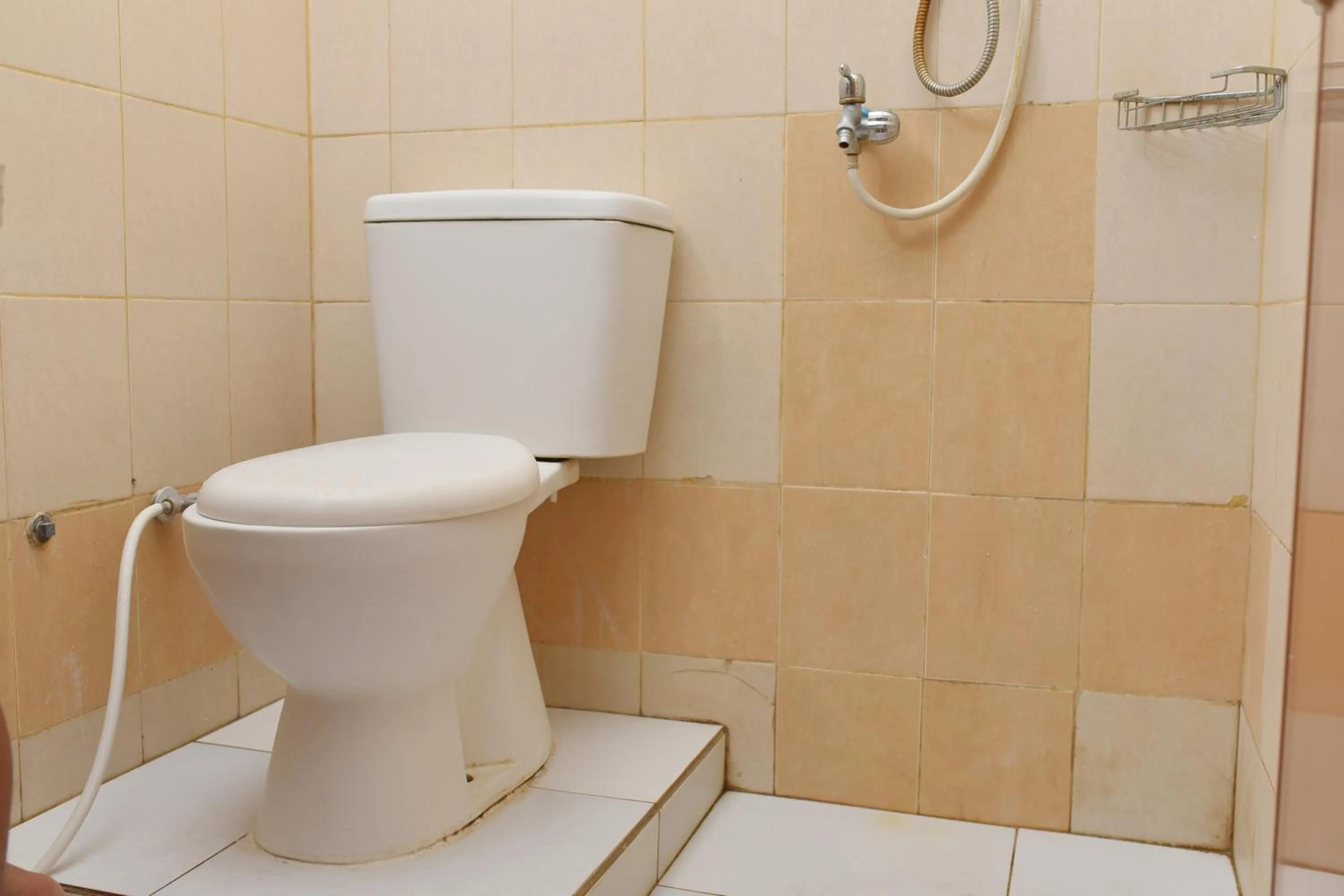 Bathroom in Al-Ghani Syariah Mitra RedDoorz