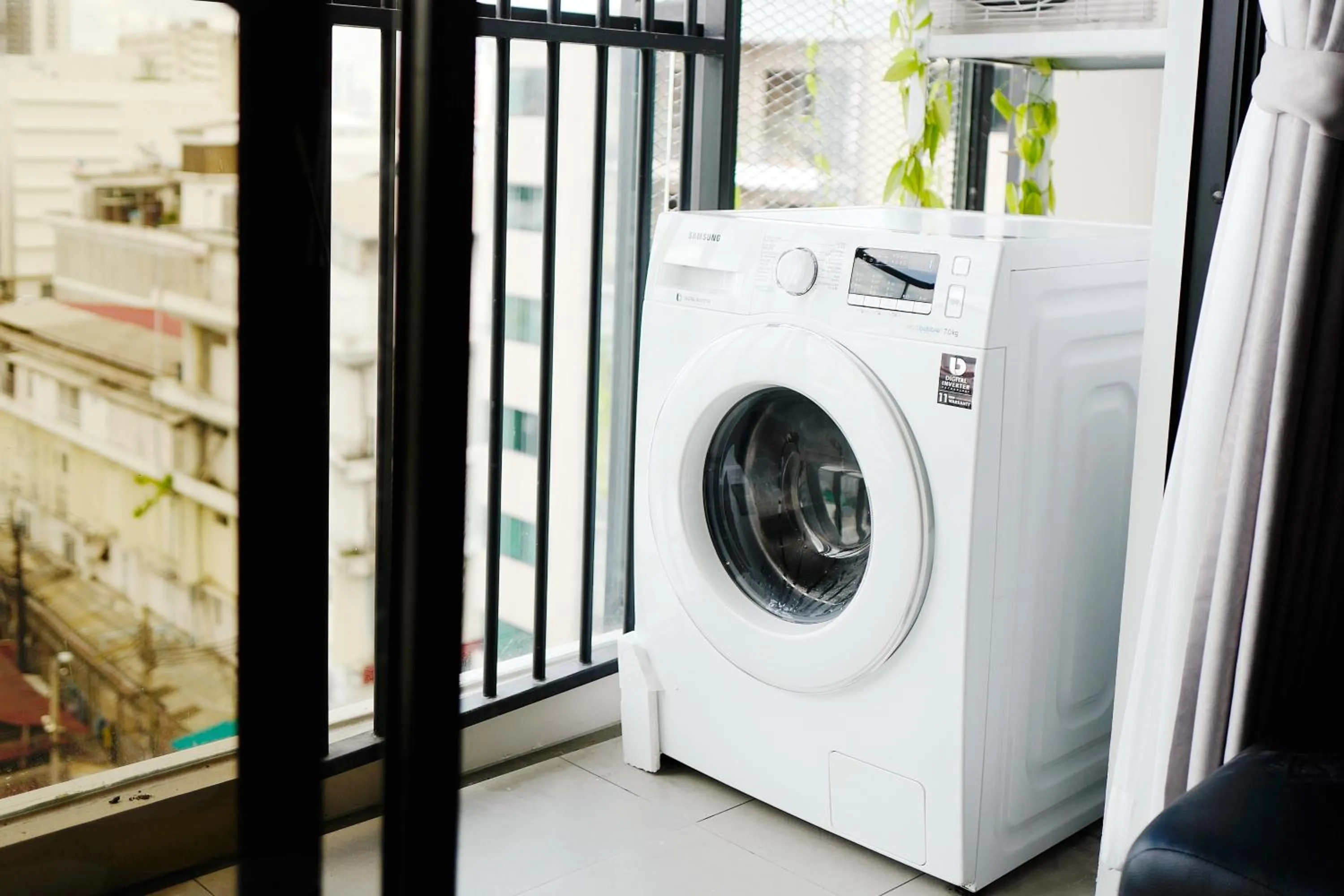 washing machine in Blossom Sathon Condo