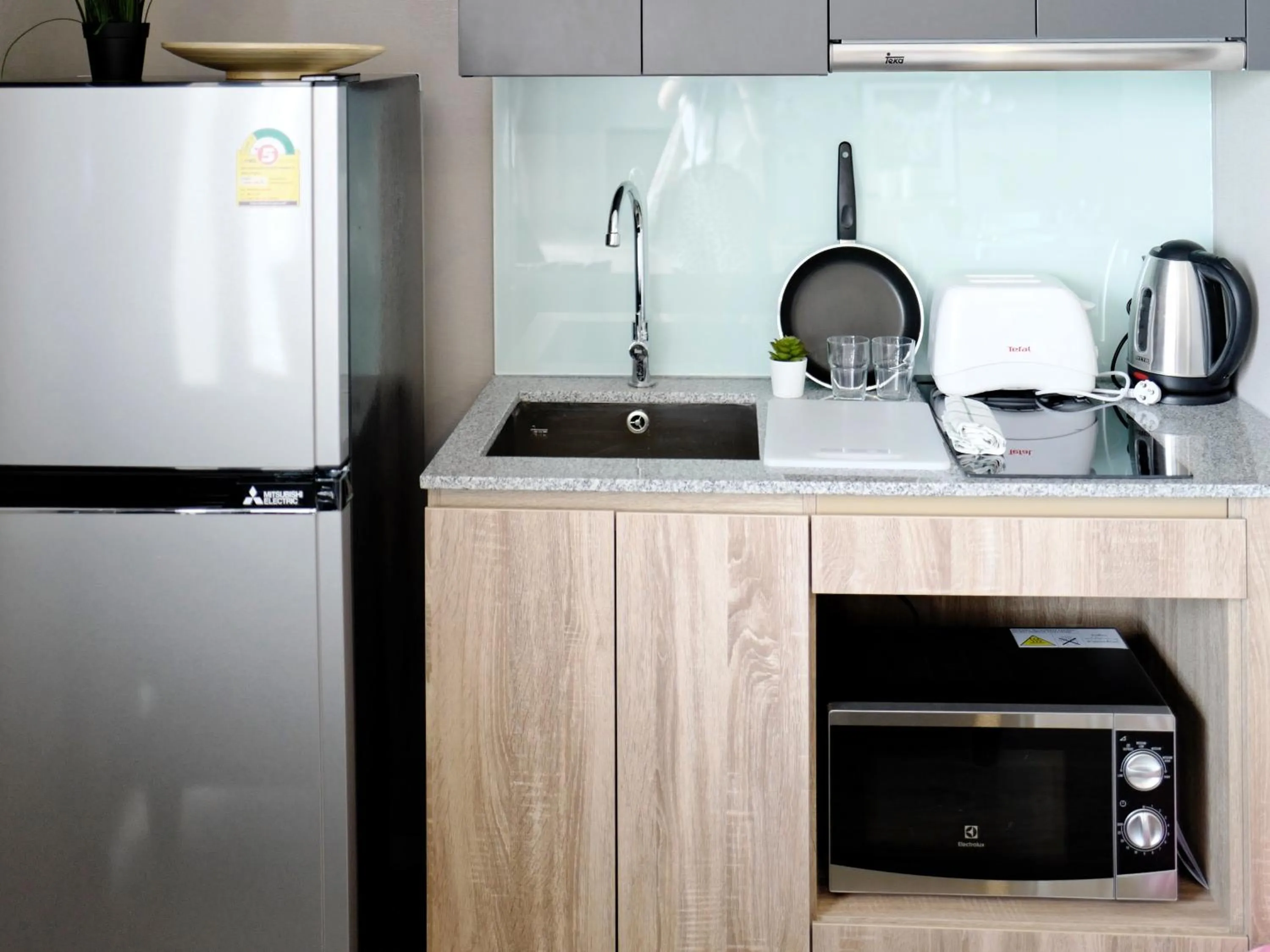 Kitchen or kitchenette in Blossom Sathon Condo