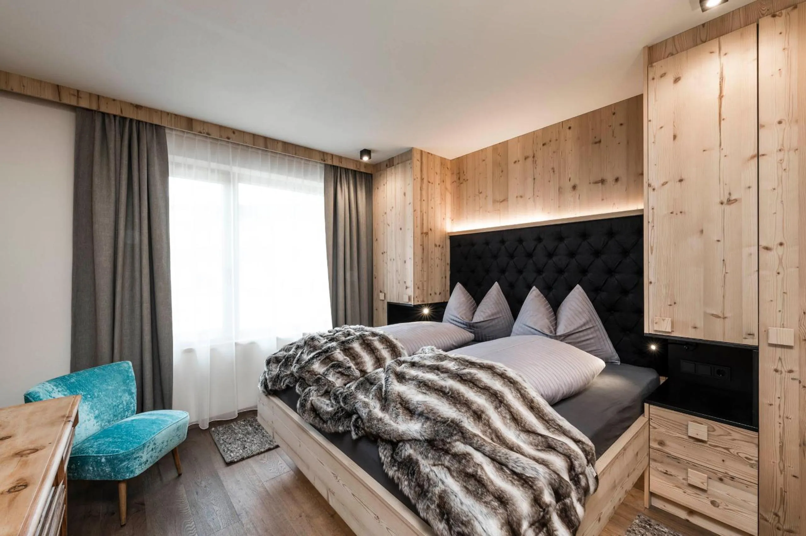 Bed in Presulis Hideaway Apartments & Restaurant