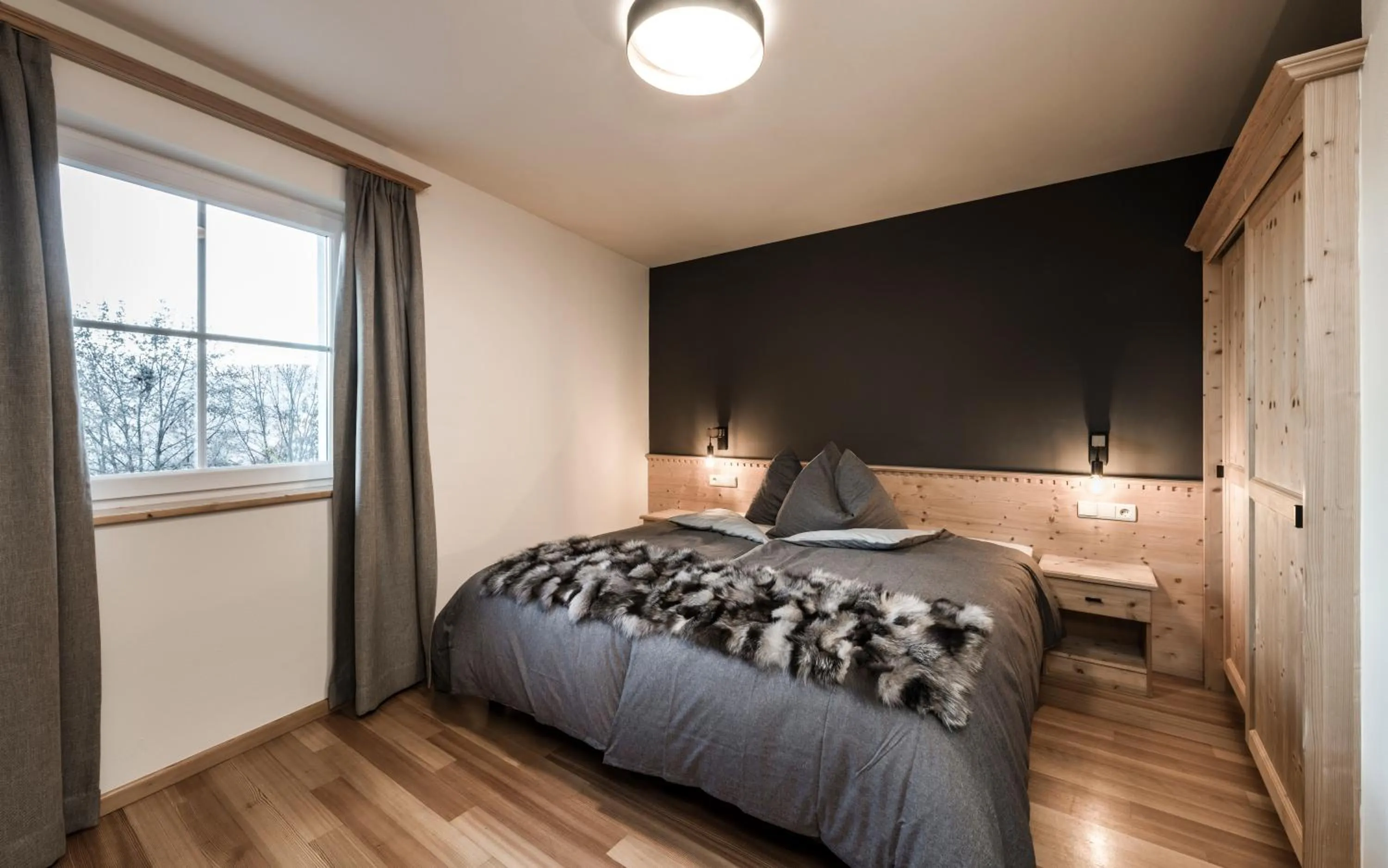 Bed in Presulis Hideaway Apartments & Restaurant