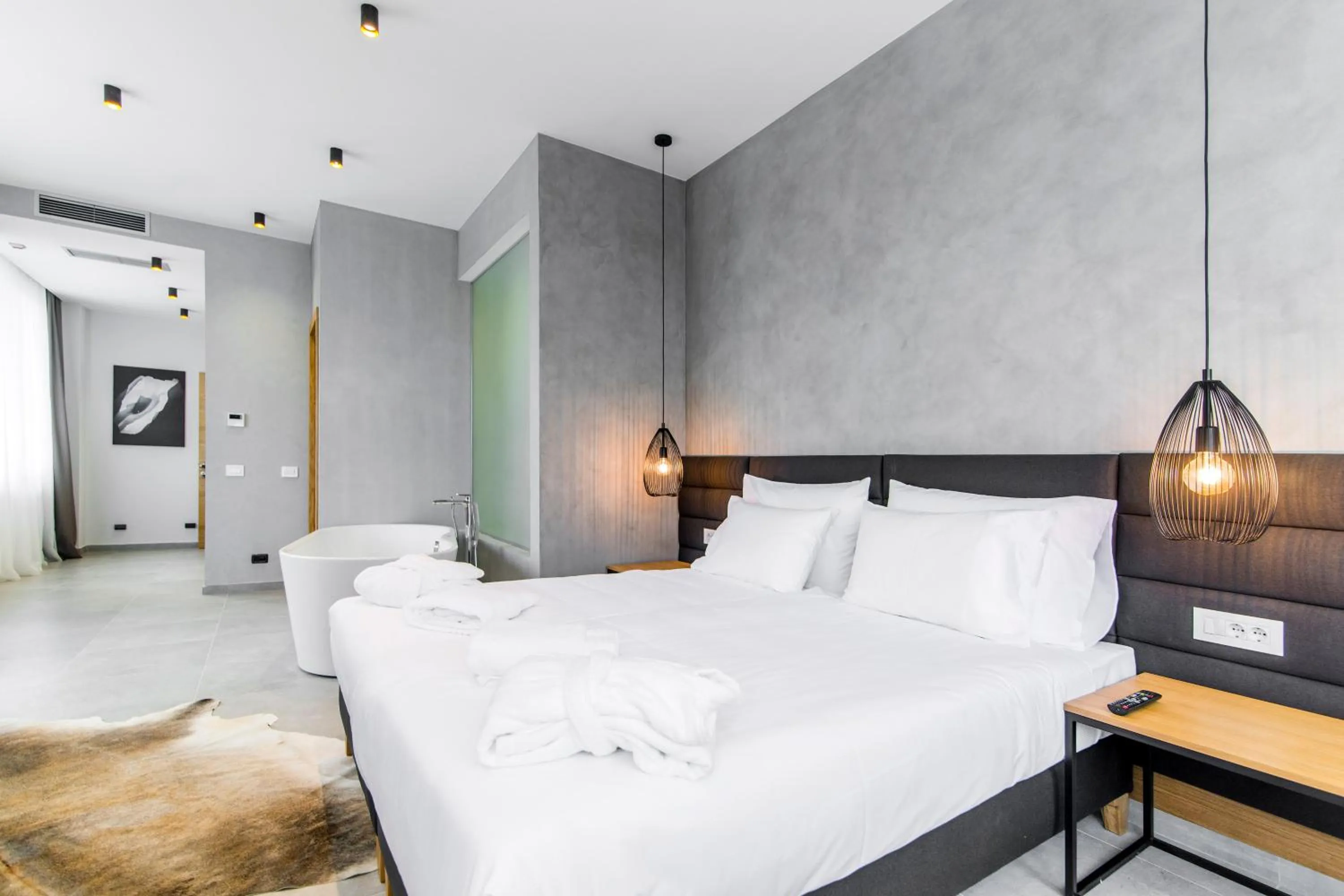 Bed in Korpa Deli Rooms