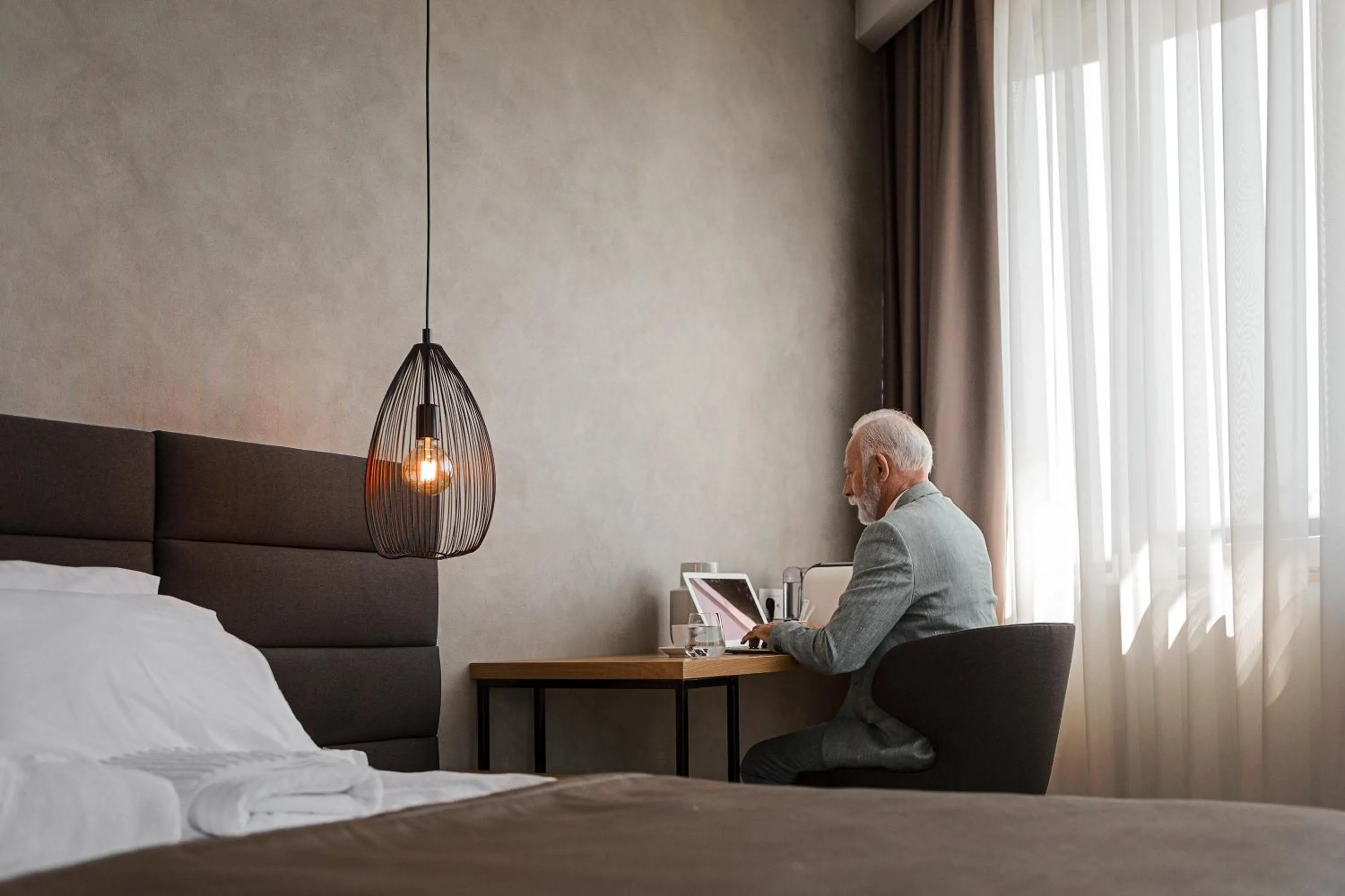 Bed in Korpa Deli Rooms