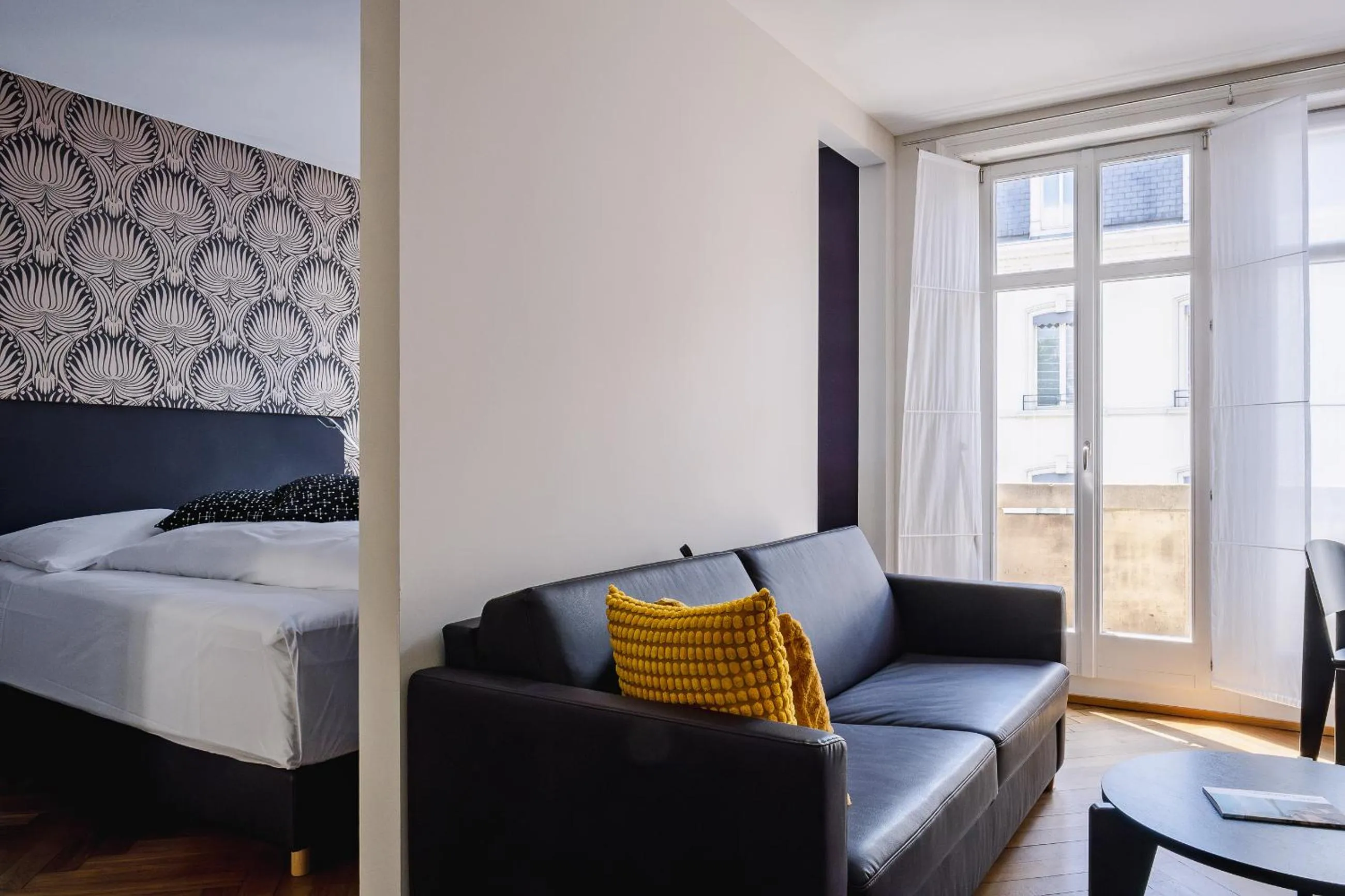 Seating area, Bed in Krafft Basel