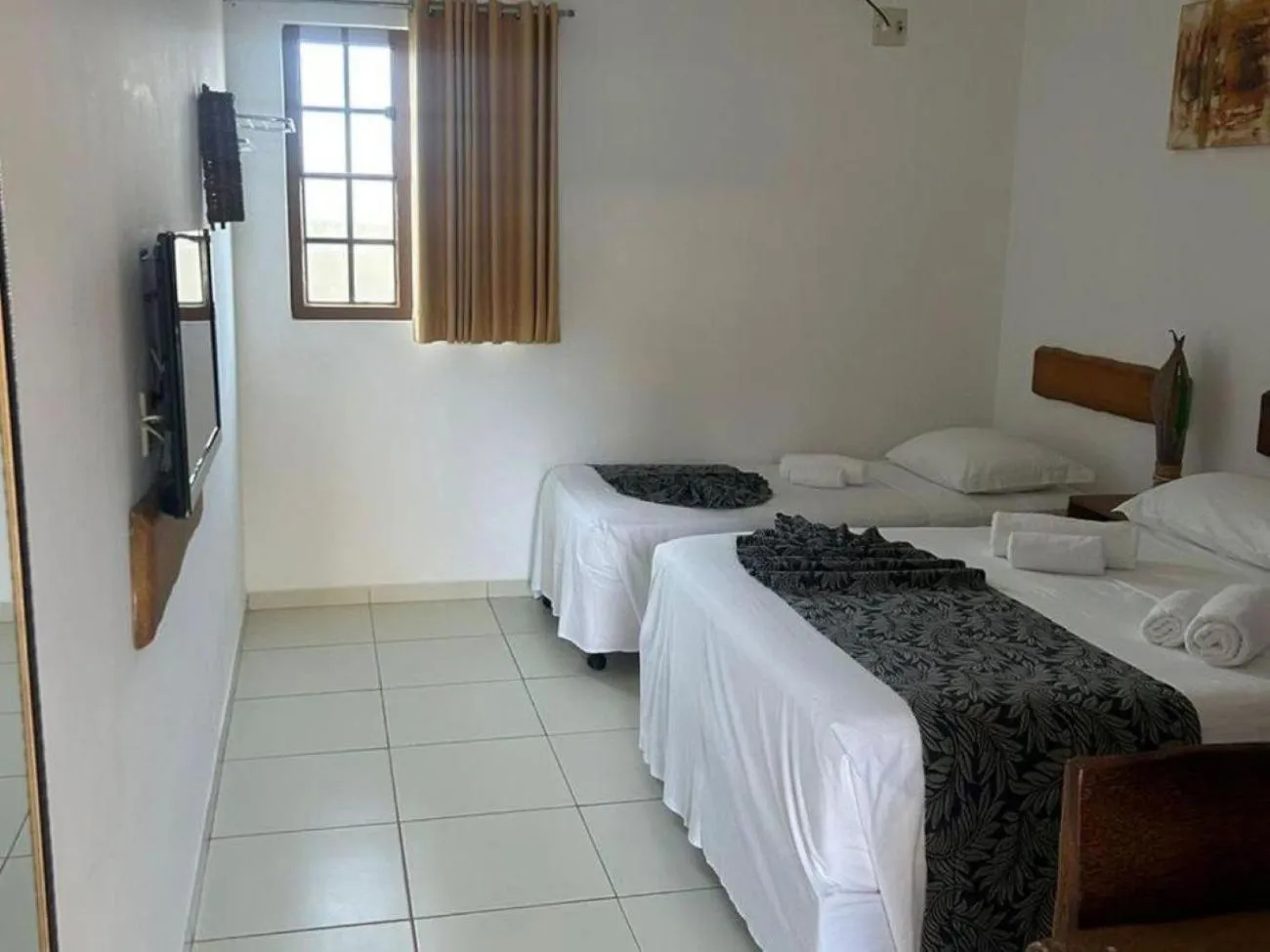 Bed in Pousada Paraiso da Barra