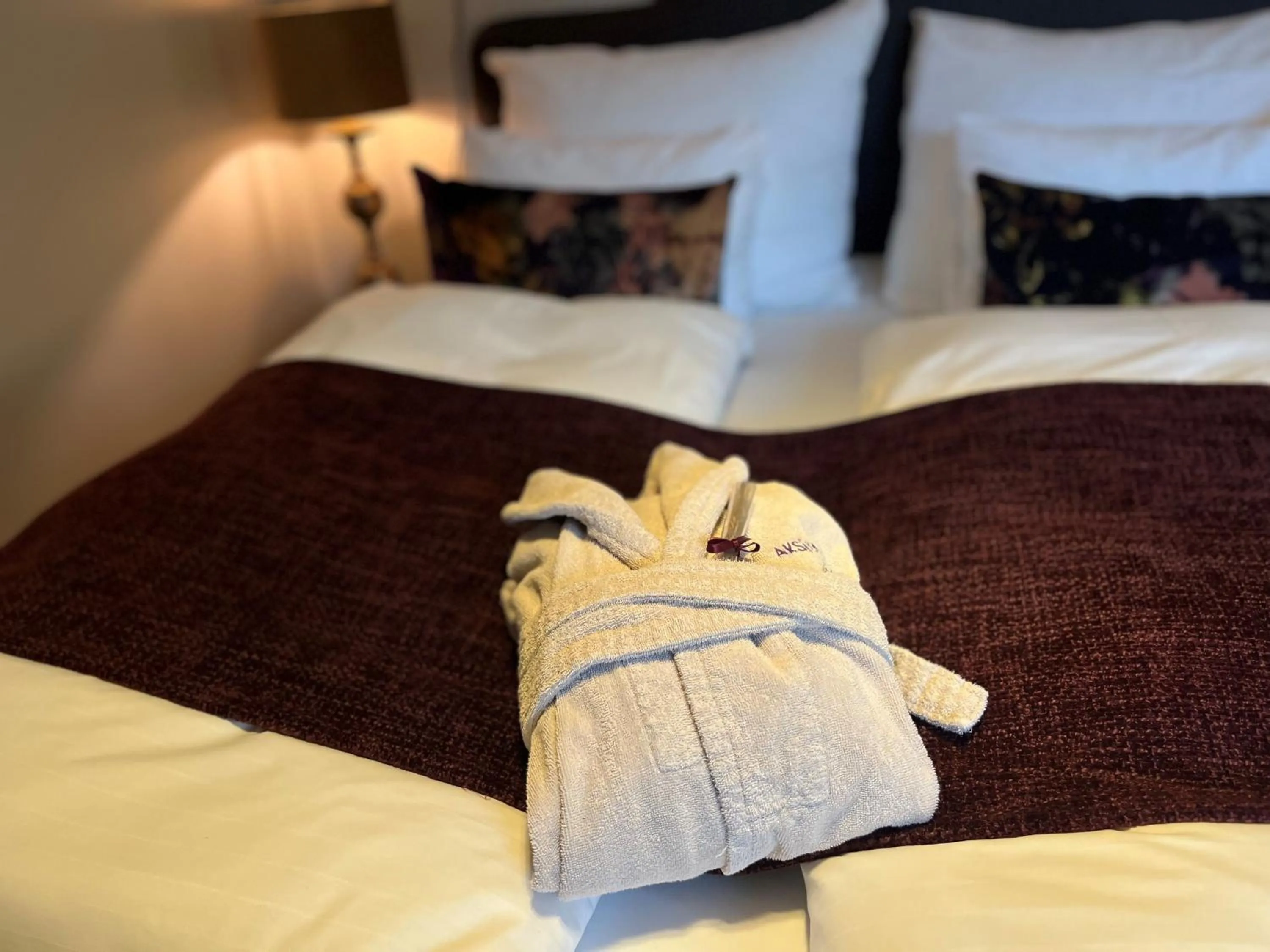 Decorative detail, Bed in Aksjemøllen - by Classic Norway Hotels