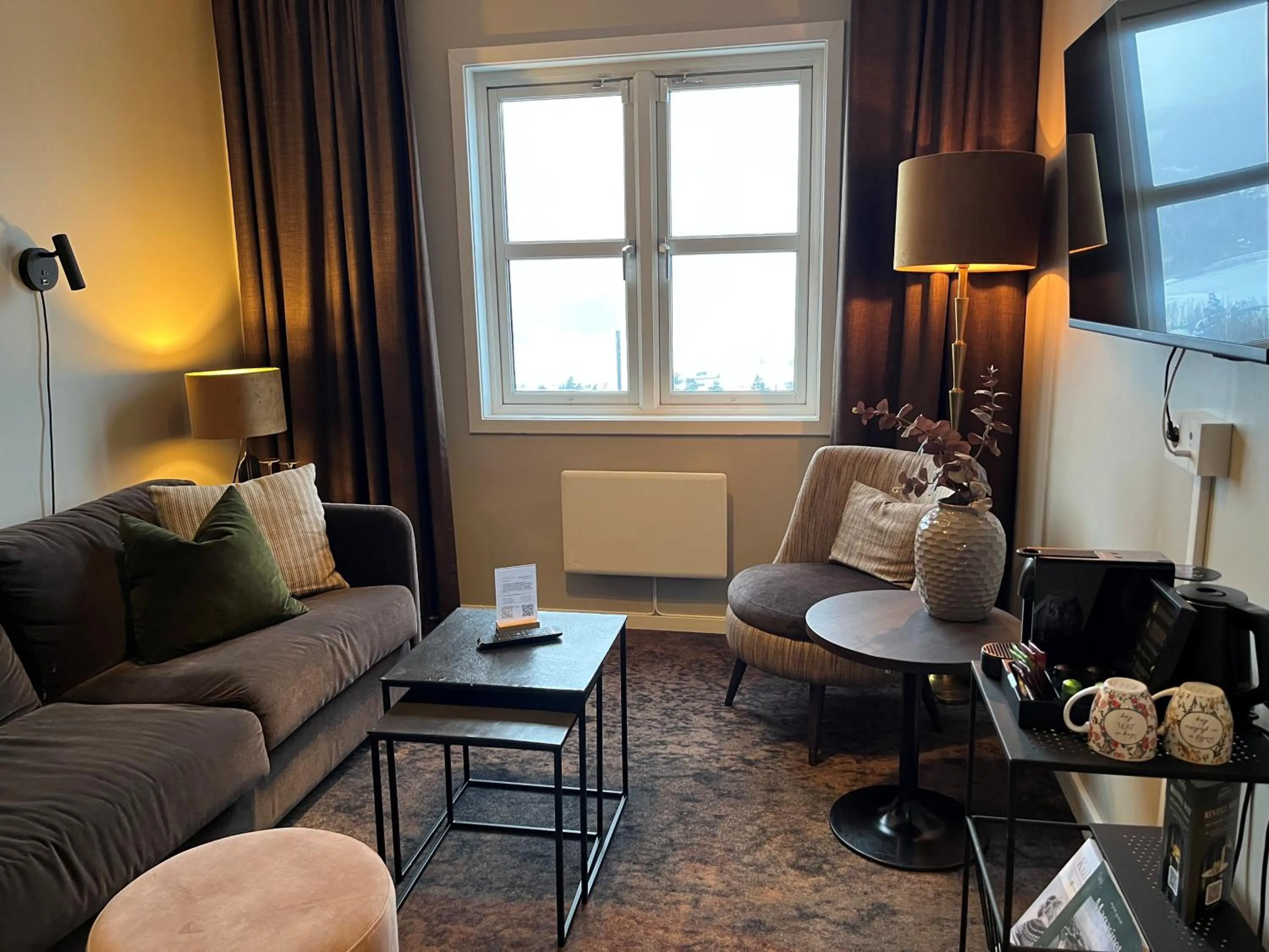 Living room in Aksjemøllen - by Classic Norway Hotels