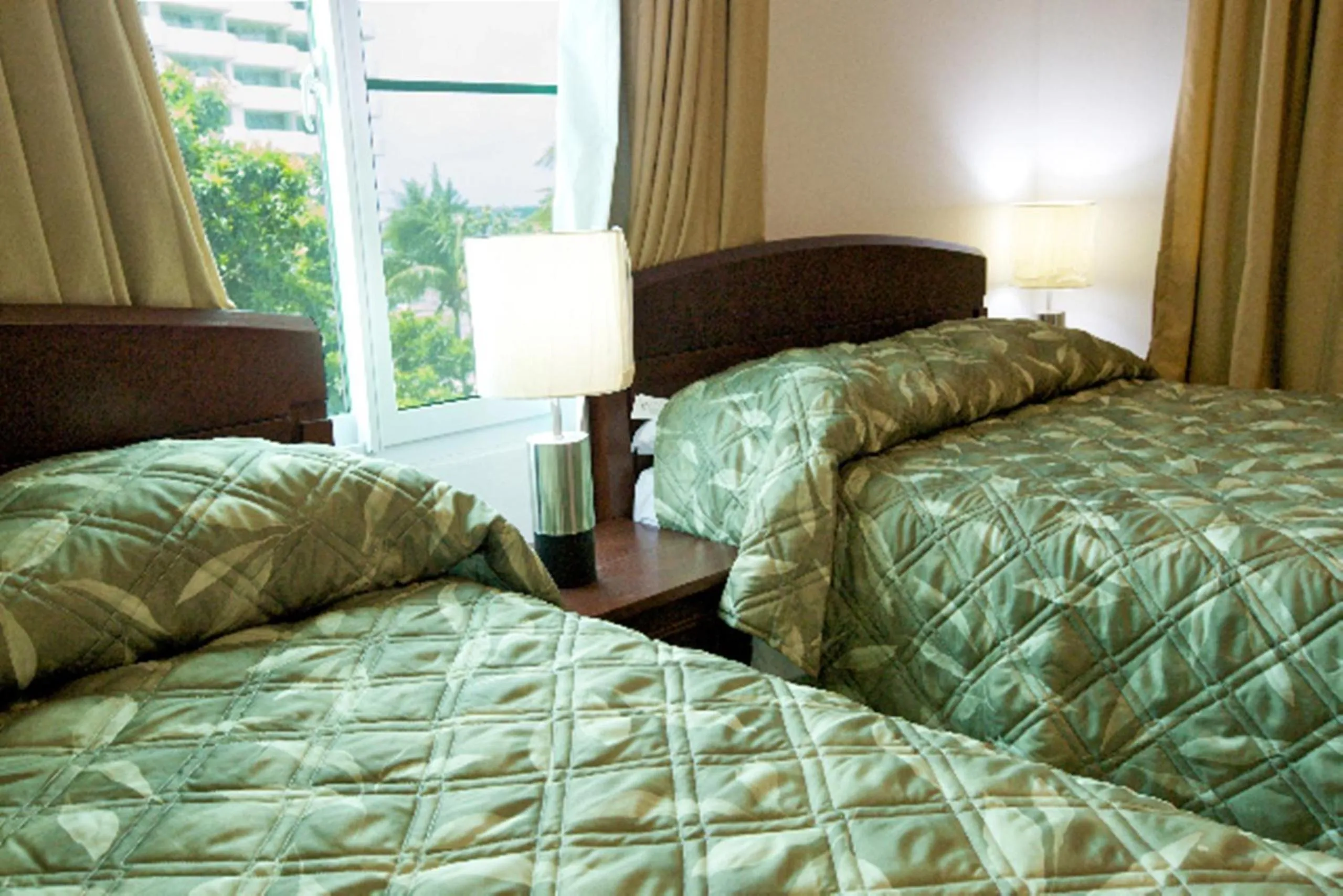 Bed in Simpson Bay Suites