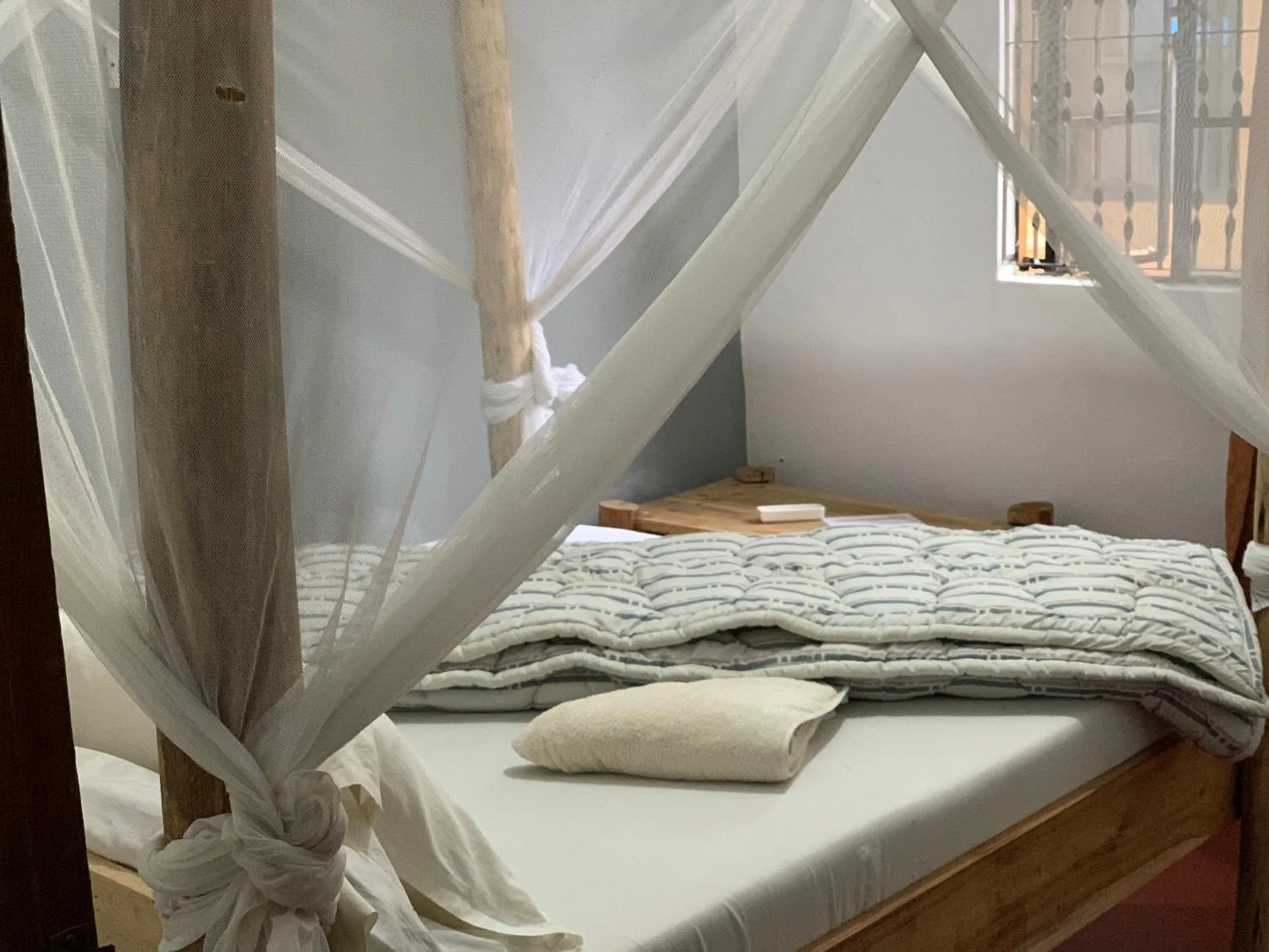 Bed in The Better Inn